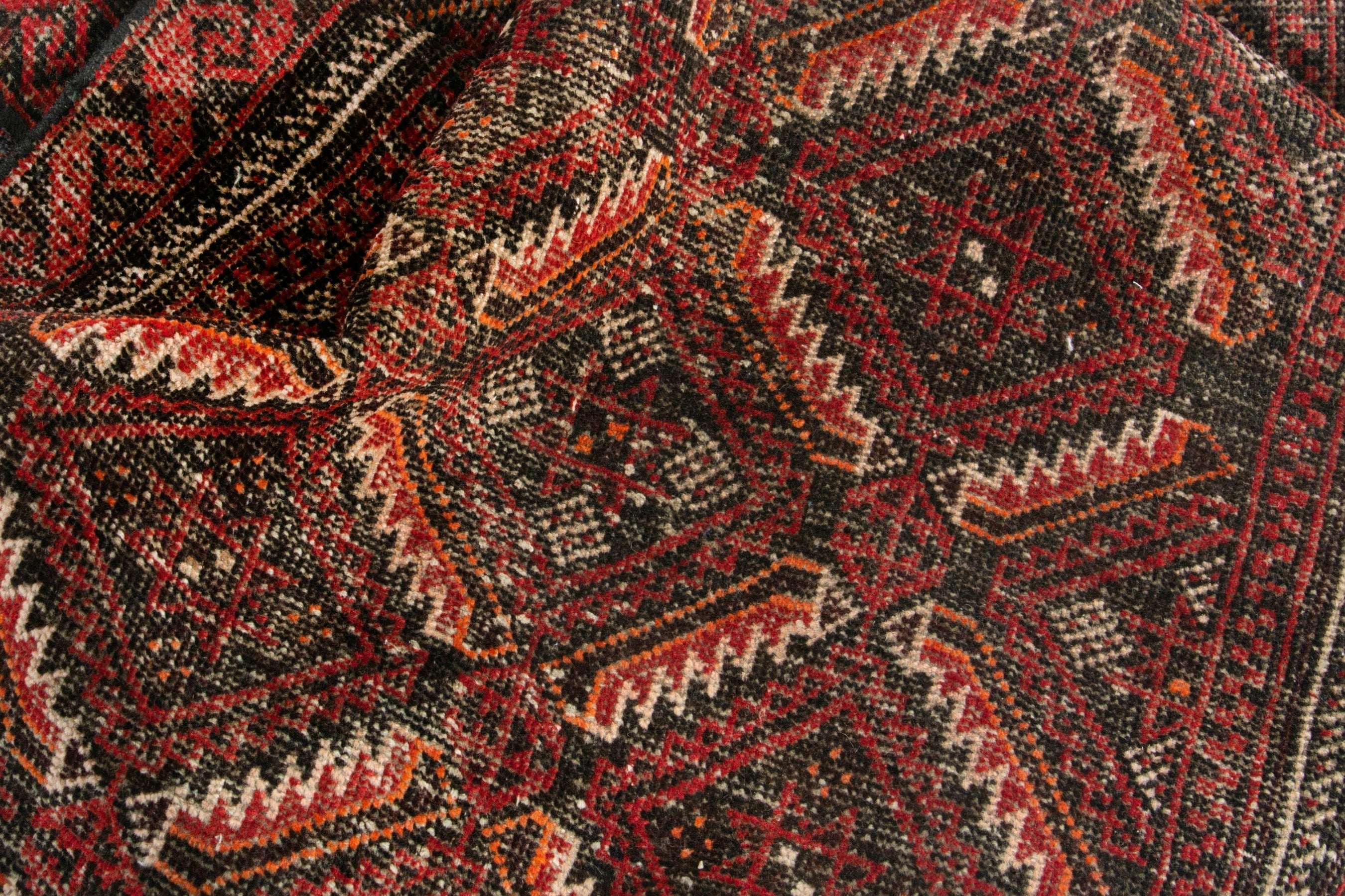 Persian Baluch accent rug in deep red and burgundy, view 14 of 18