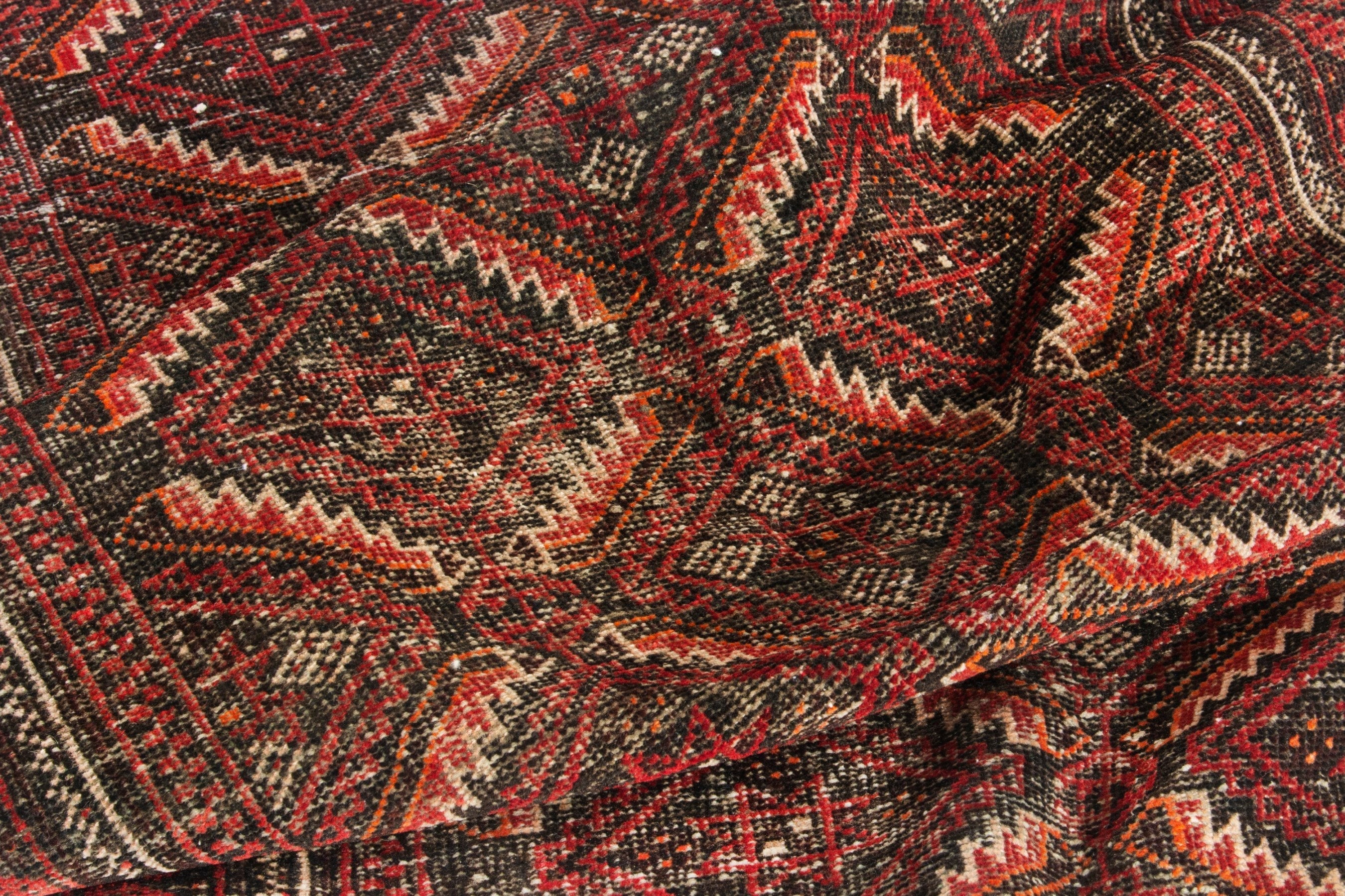 Persian Baluch accent rug in deep red and burgundy, view 16 of 18