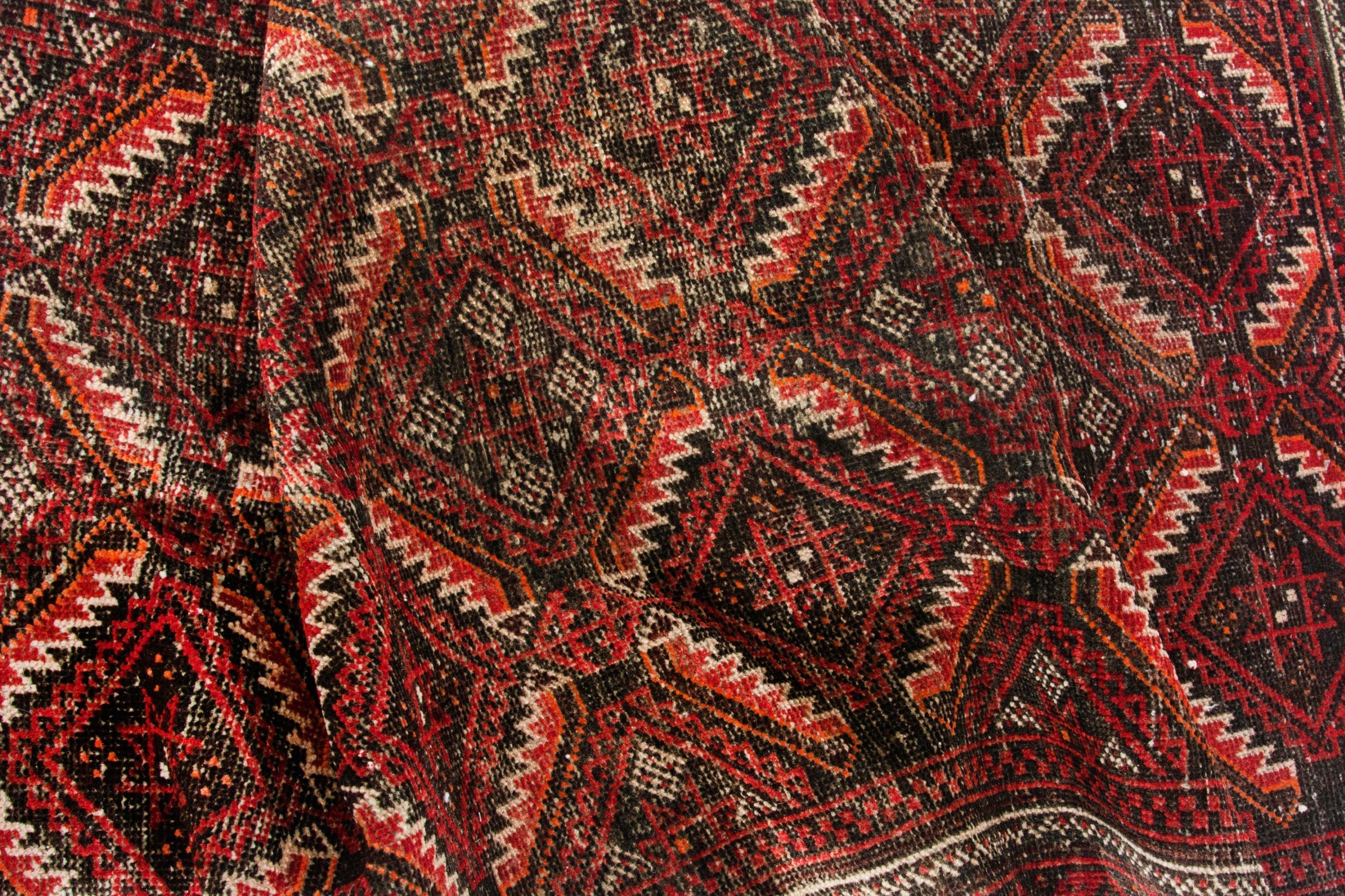 Persian Baluch accent rug in deep red and burgundy, view 17 of 18