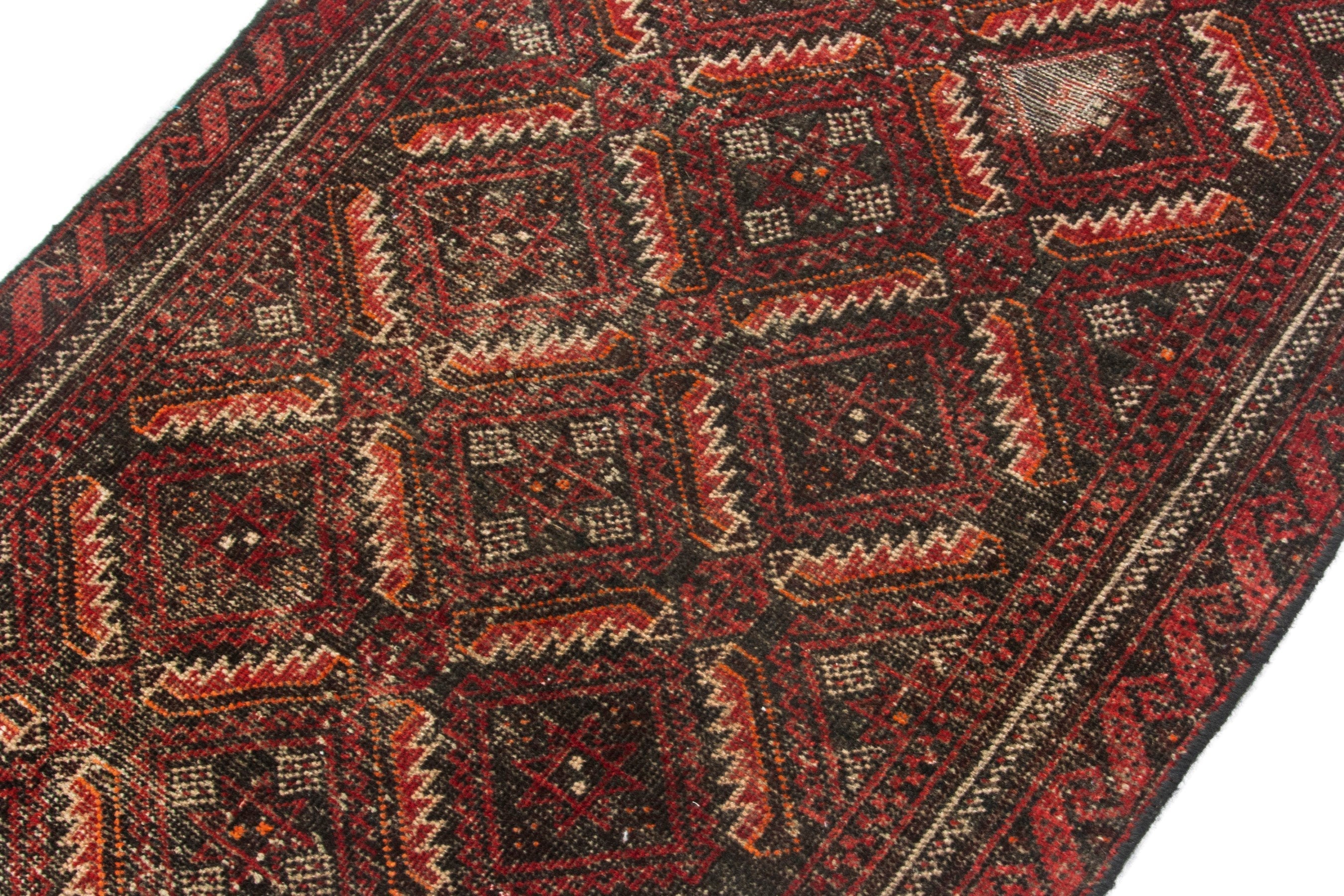 Persian Baluch accent rug in deep red and burgundy, view 5 of 18