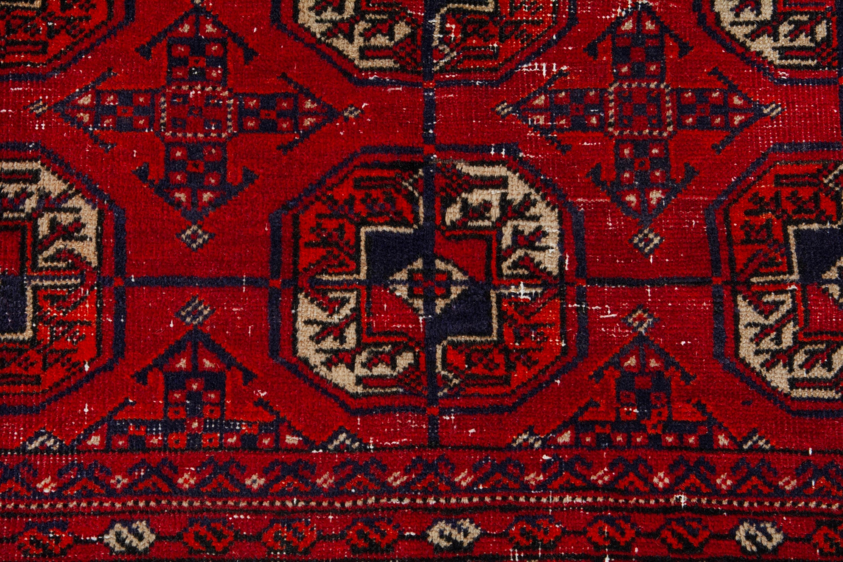 Persian Torkaman area rug in deep red and muted yellow, view 11 of 20