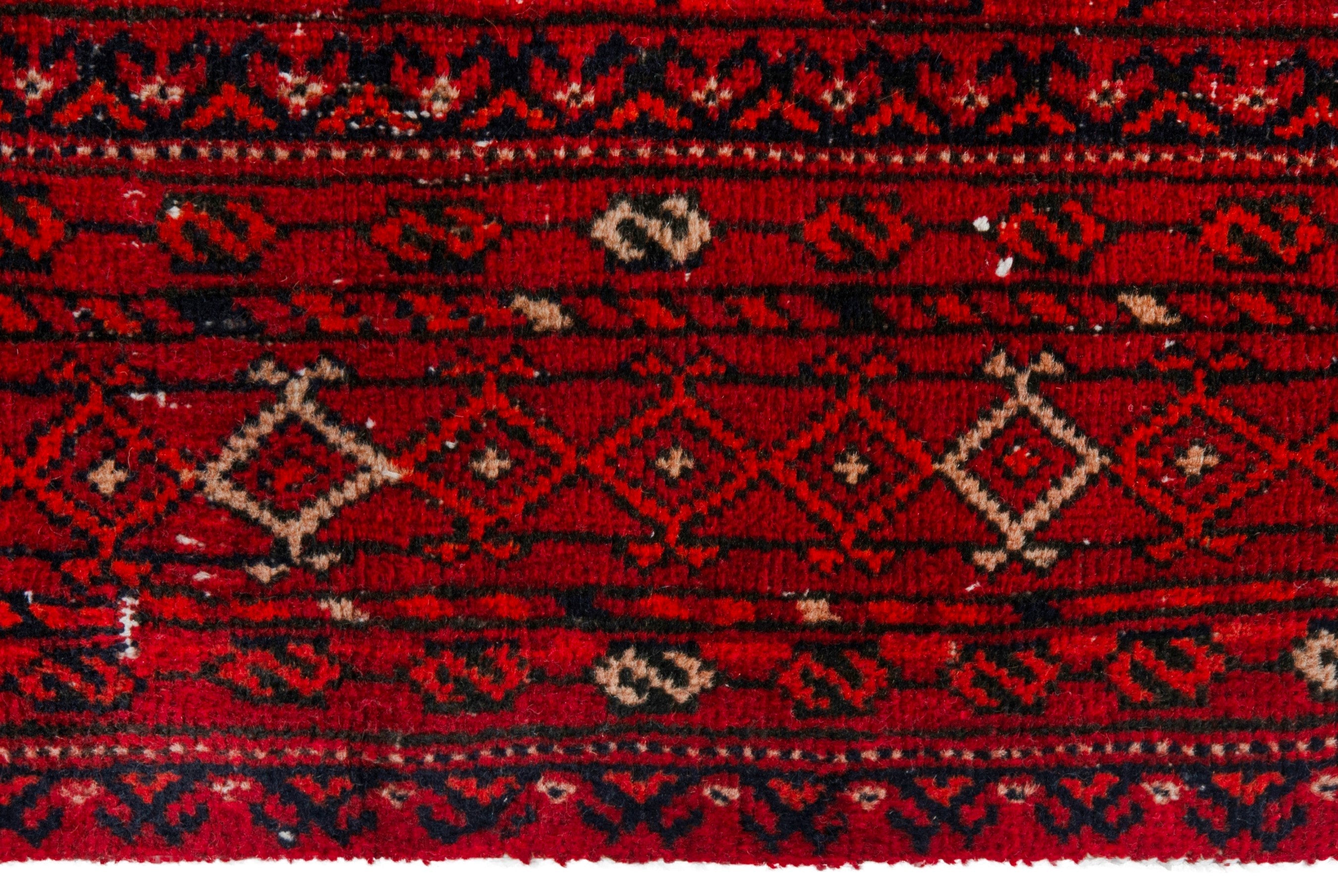 Persian Torkaman area rug in deep red and muted yellow, view 13 of 20