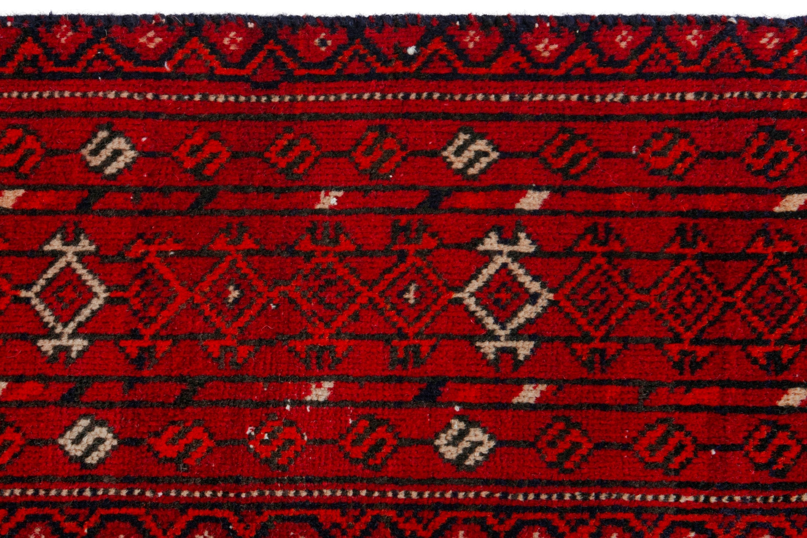 Persian Torkaman area rug in deep red and muted yellow, view 14 of 20