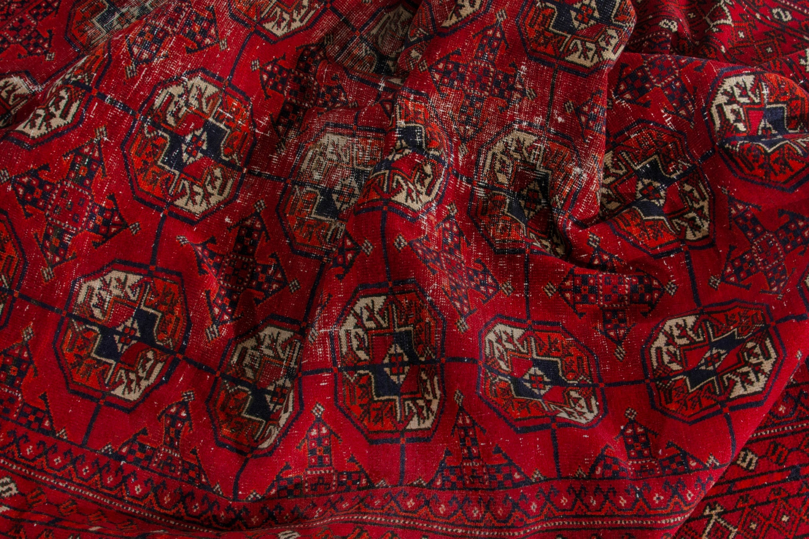 Persian Torkaman area rug in deep red and muted yellow, view 17 of 20