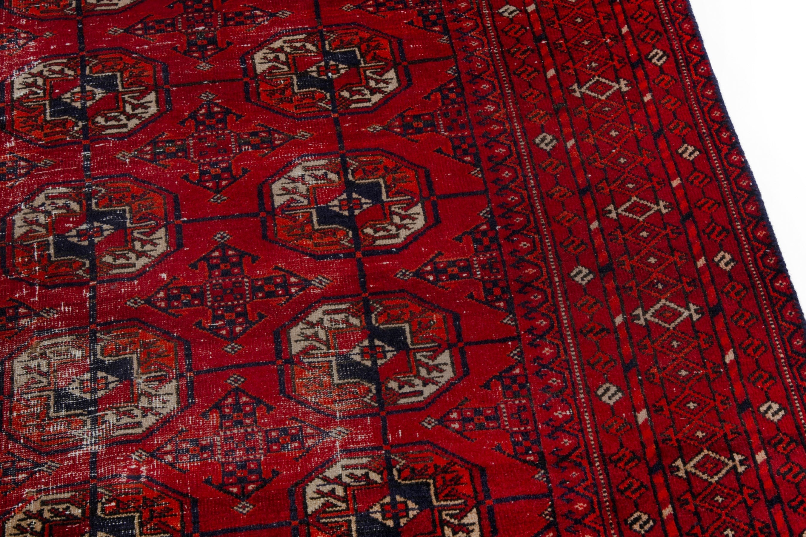 Persian Torkaman area rug in deep red and muted yellow, view 7 of 20