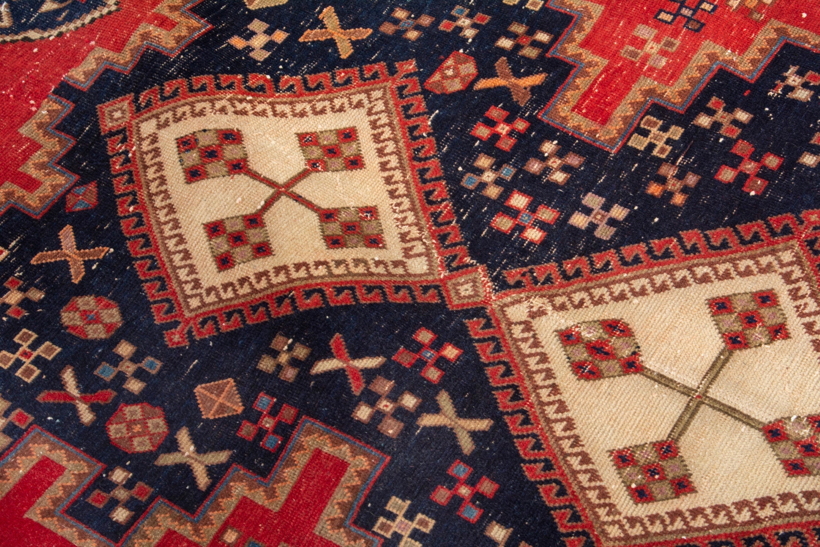 Persian Sirjan accent rug in deep red and navy, view 17 of 18