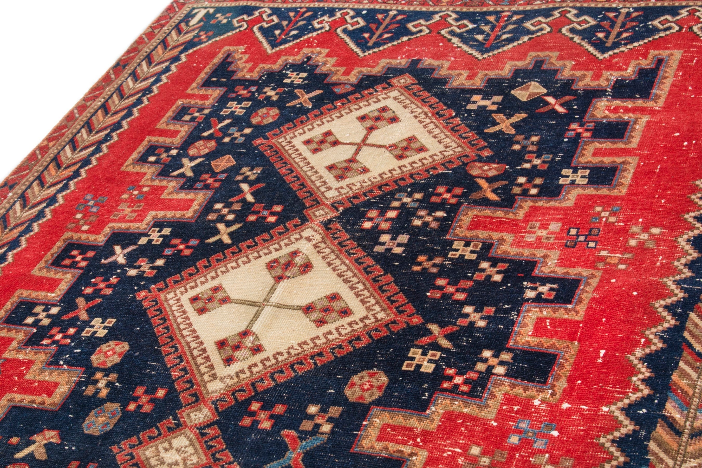 Persian Sirjan accent rug in deep red and navy, view 8 of 18