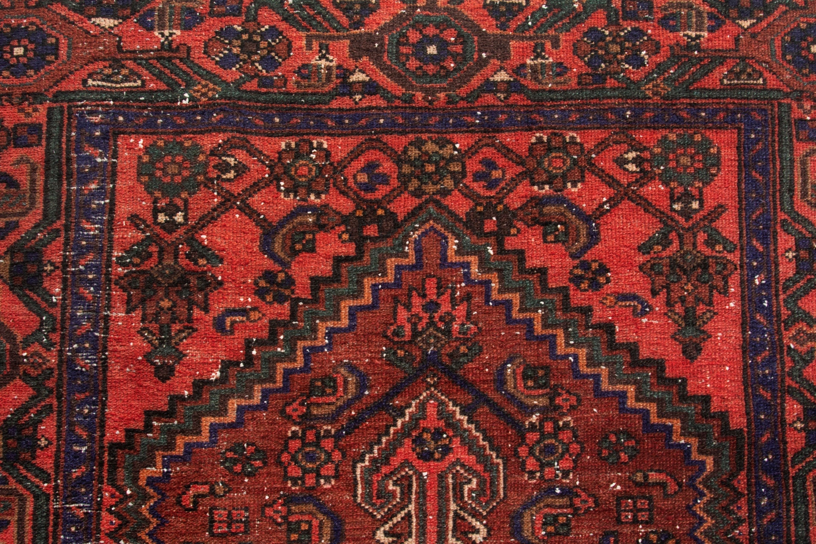 Persian Zanjan area rug in burgundy and rust, view 16 of 21