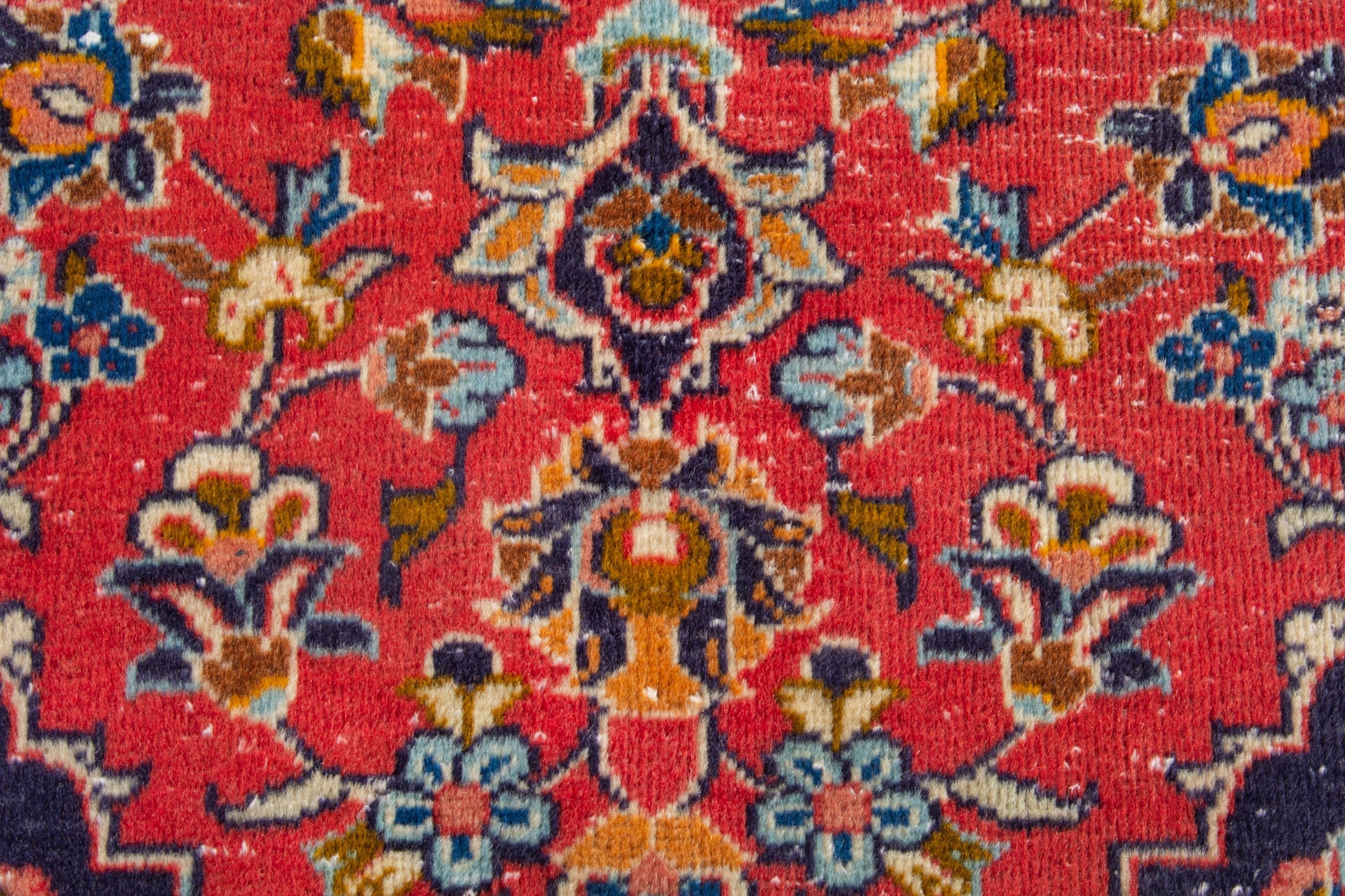 Persian Kashan accent rug in deep red and navy, view 11 of 17