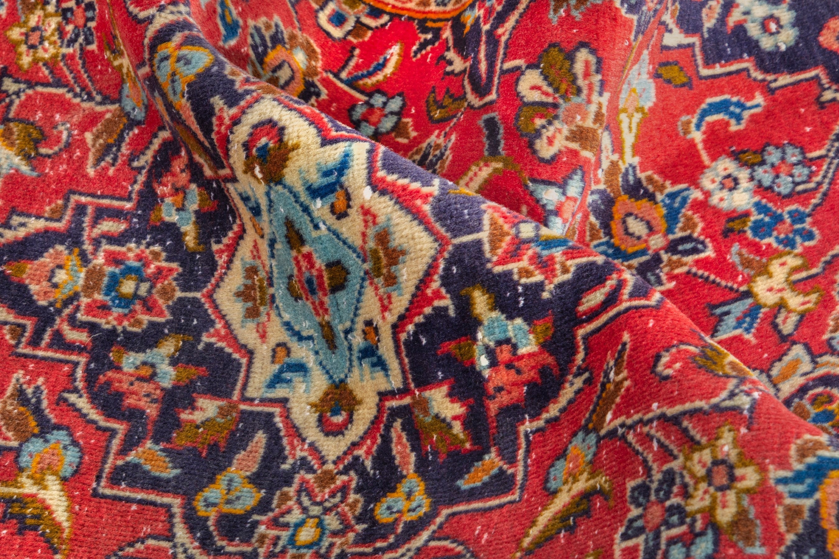 Persian Kashan accent rug in deep red and navy, view 14 of 17