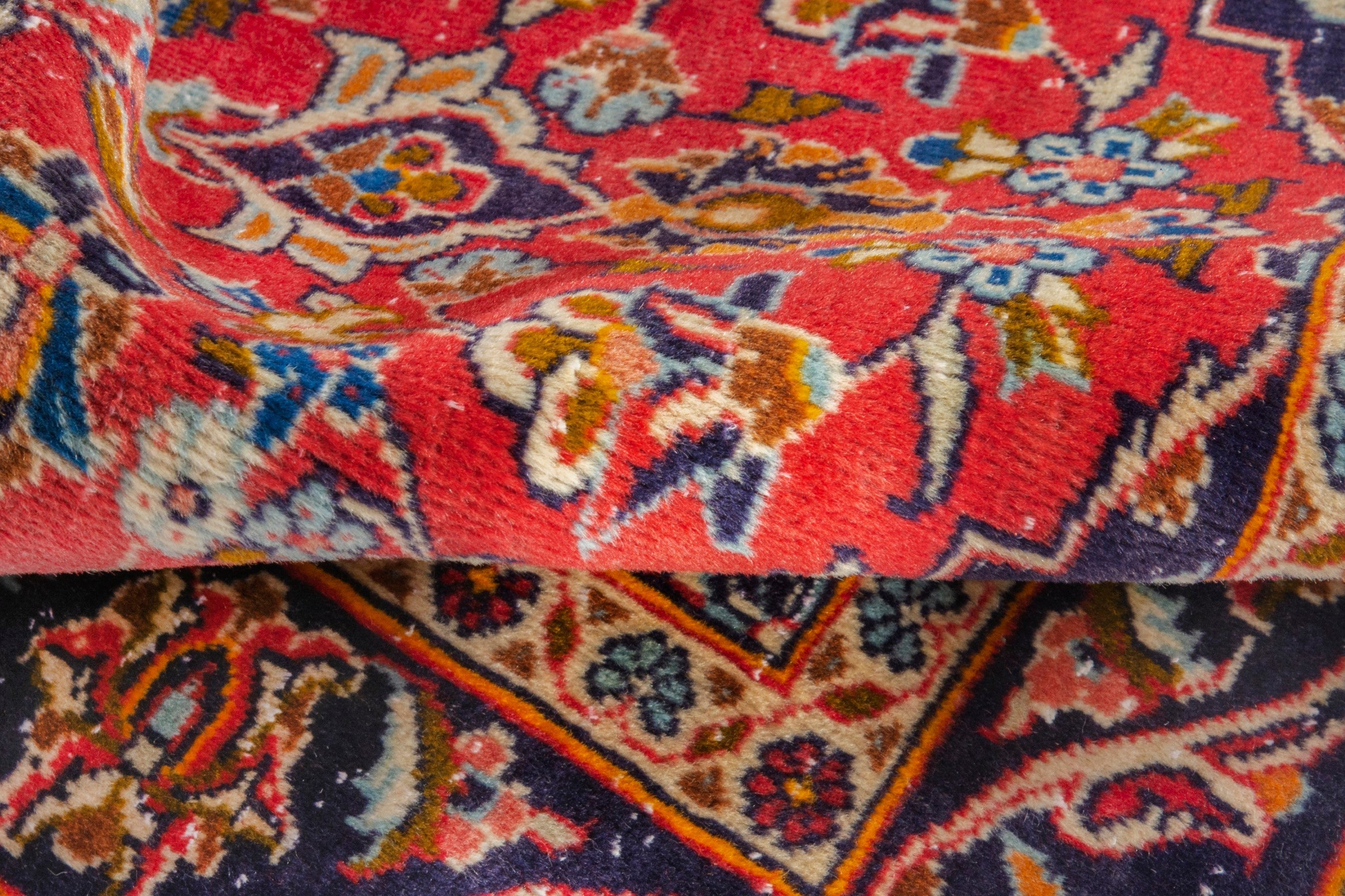 Persian Kashan accent rug in deep red and navy, view 15 of 17