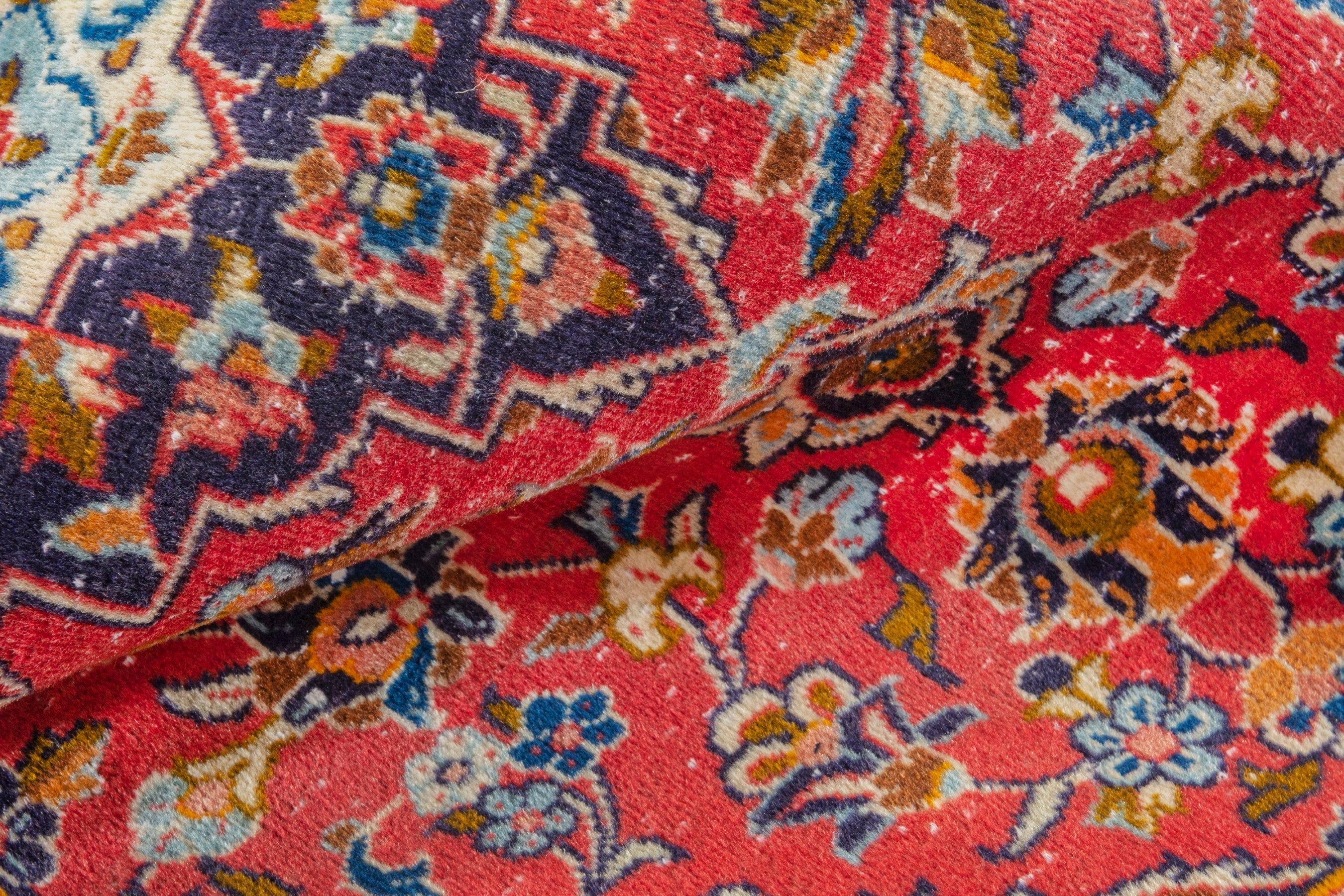 Persian Kashan accent rug in deep red and navy, view 16 of 17