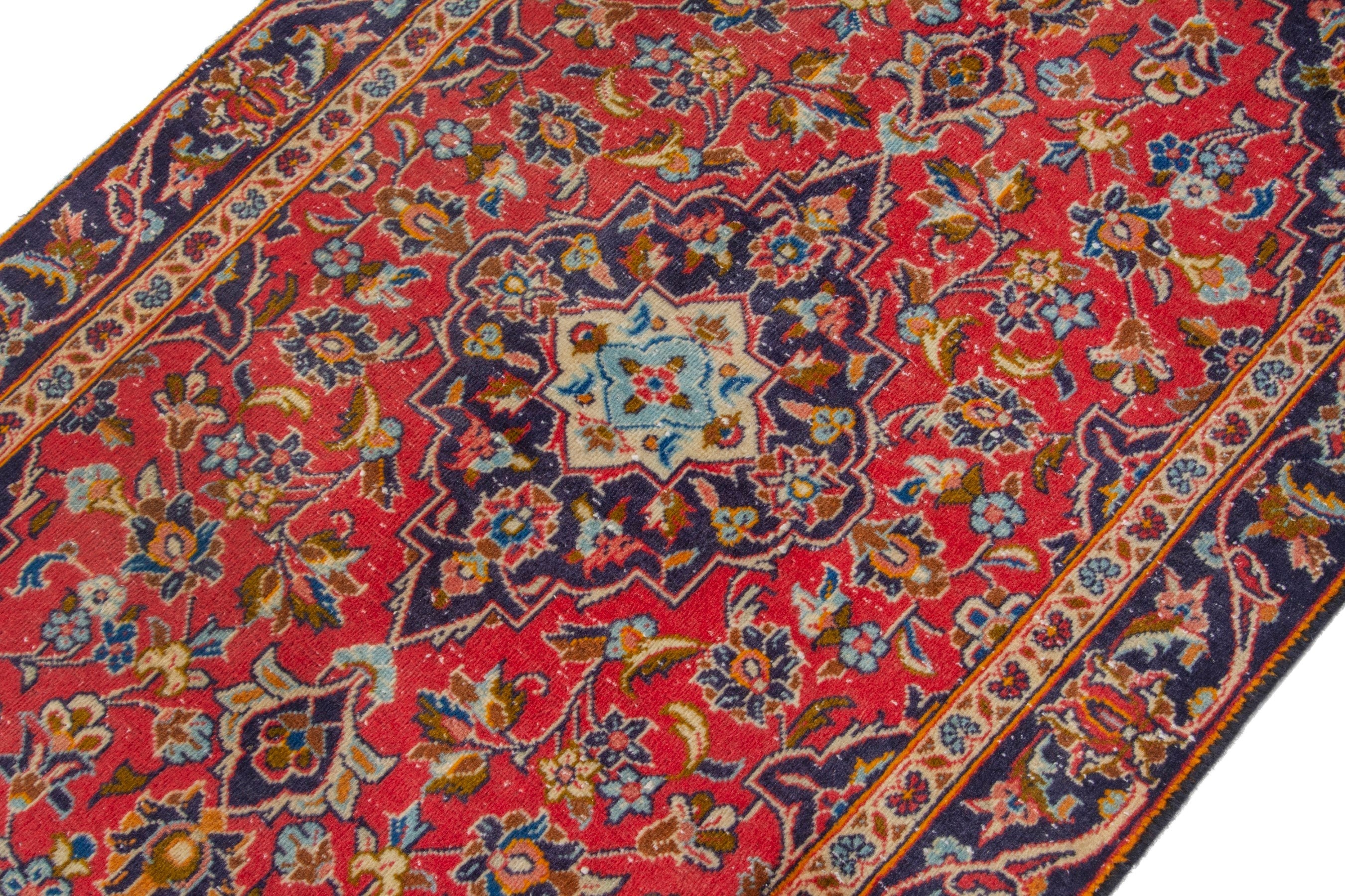 Persian Kashan accent rug in deep red and navy, view 5 of 17