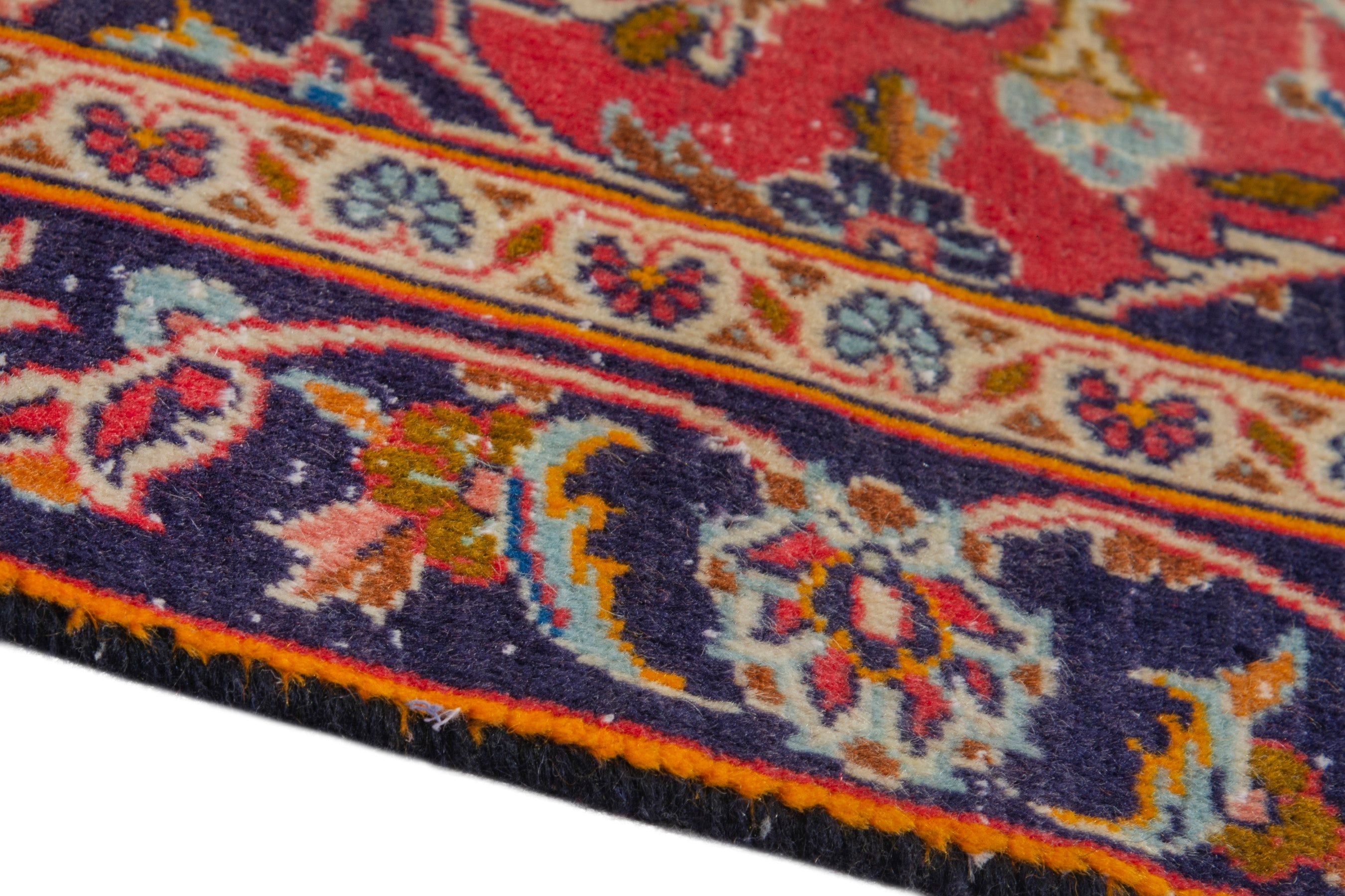 Persian Kashan accent rug in deep red and navy, view 6 of 17