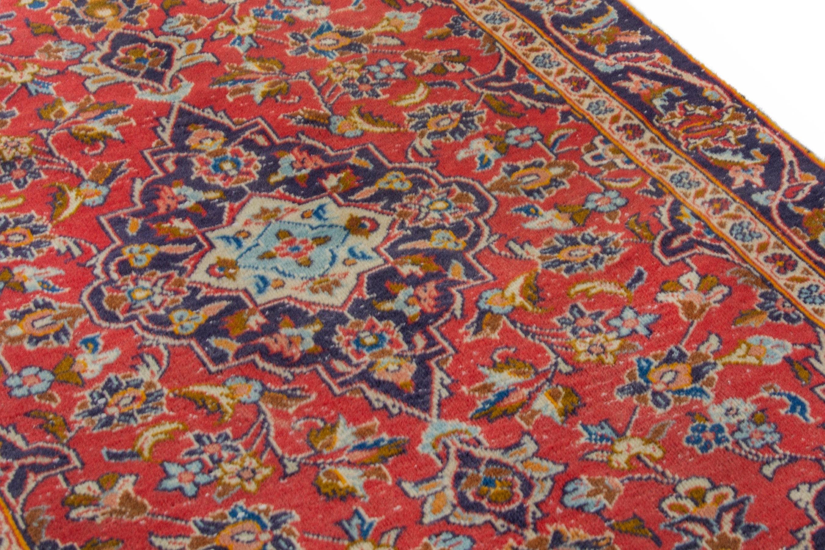 Persian Kashan accent rug in deep red and navy, view 8 of 17