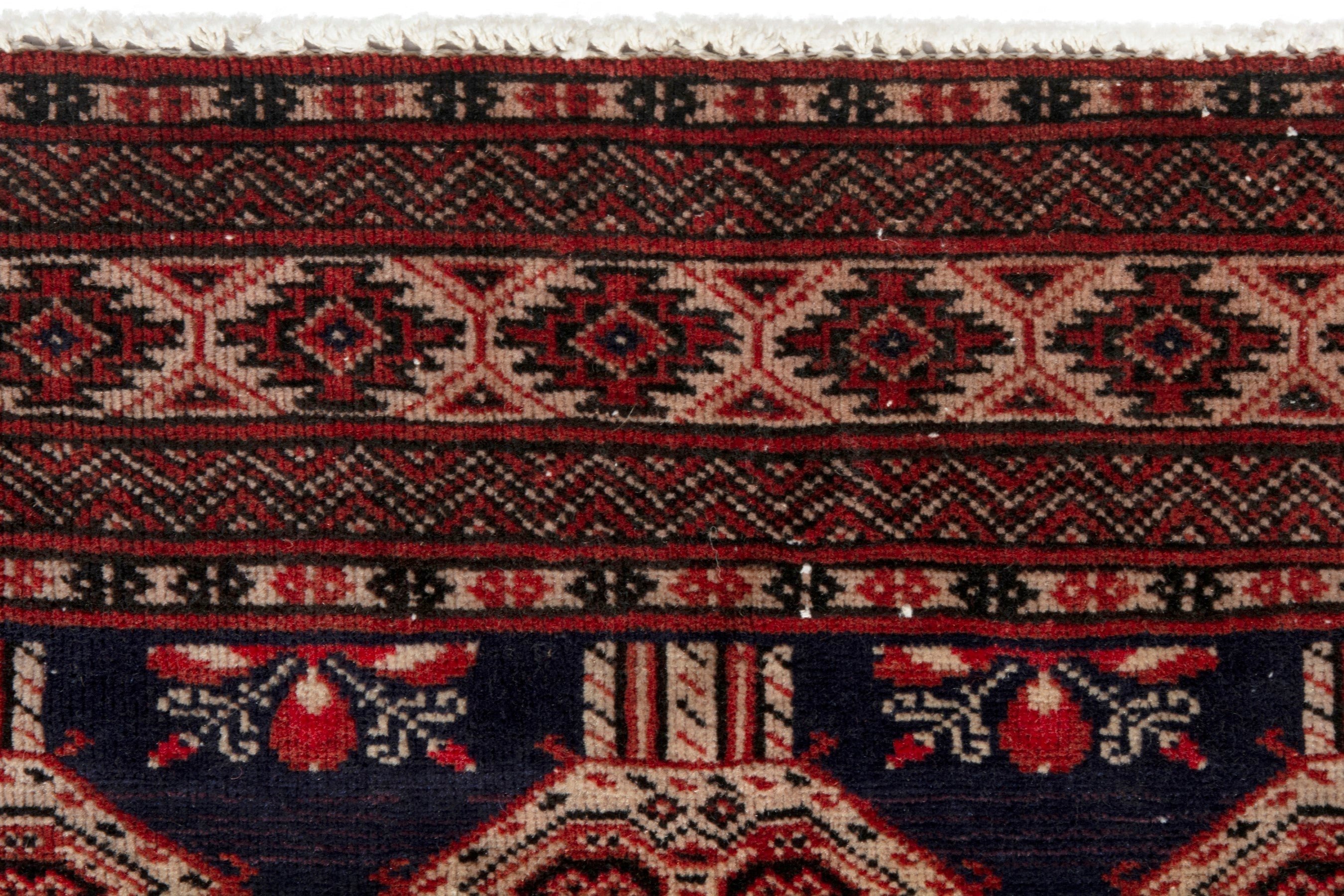 Persian Torkaman accent rug in navy and rust, view 11 of 19