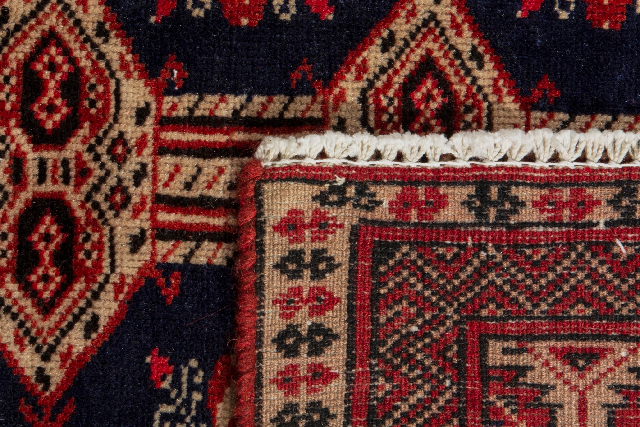 Persian Torkaman accent rug in navy and rust, view 19 of 19