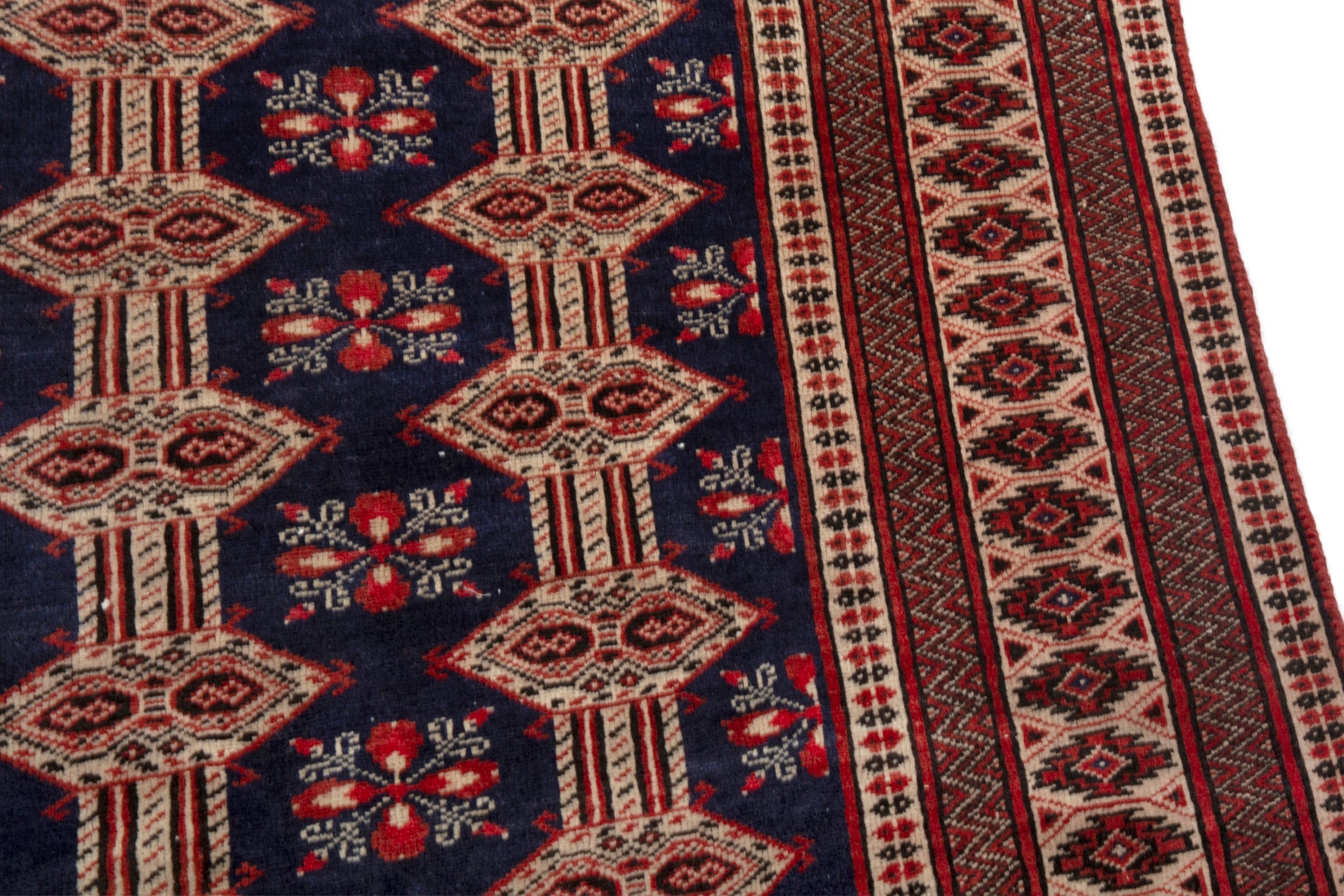 Persian Torkaman accent rug in navy and rust, view 7 of 19