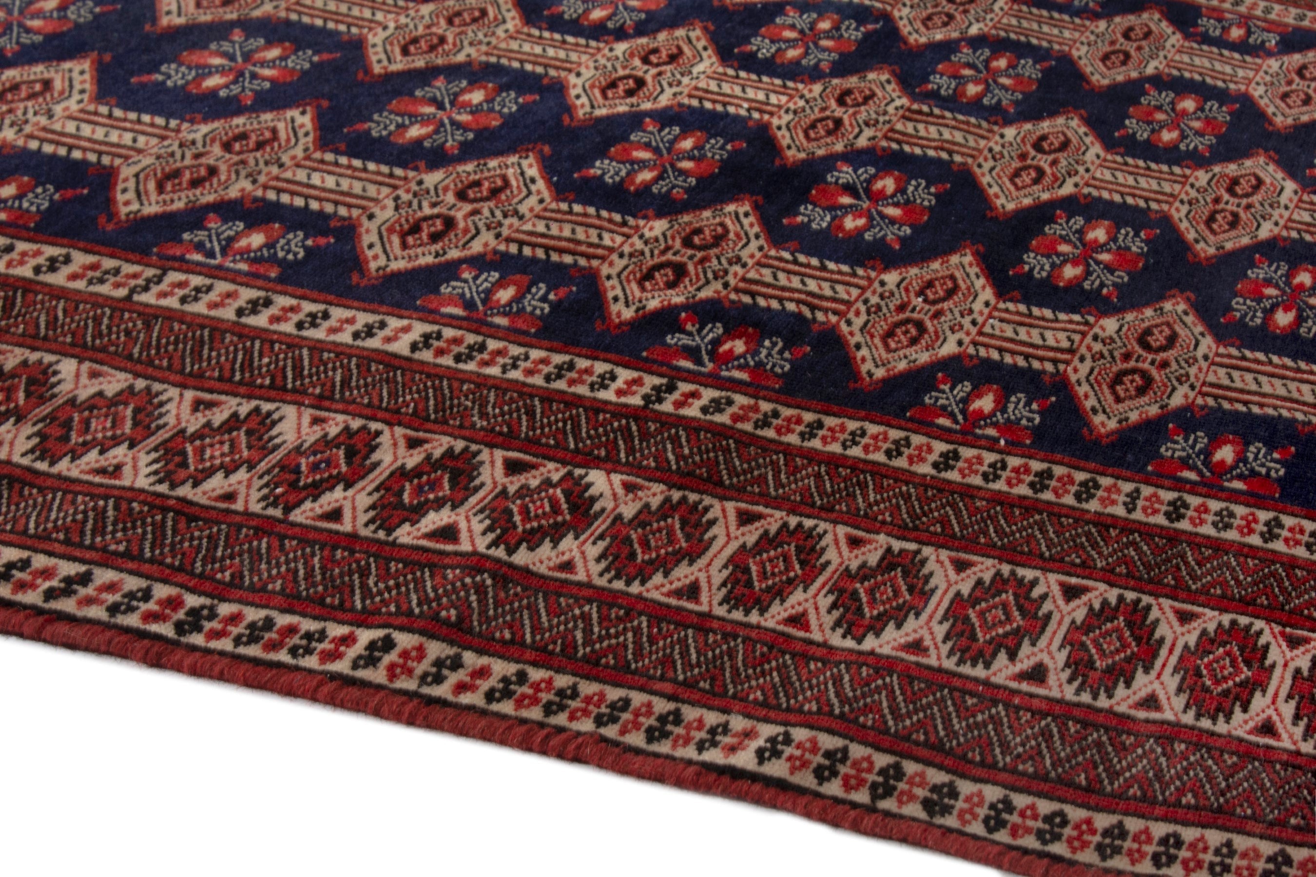 Persian Torkaman accent rug in navy and rust, view 6 of 19
