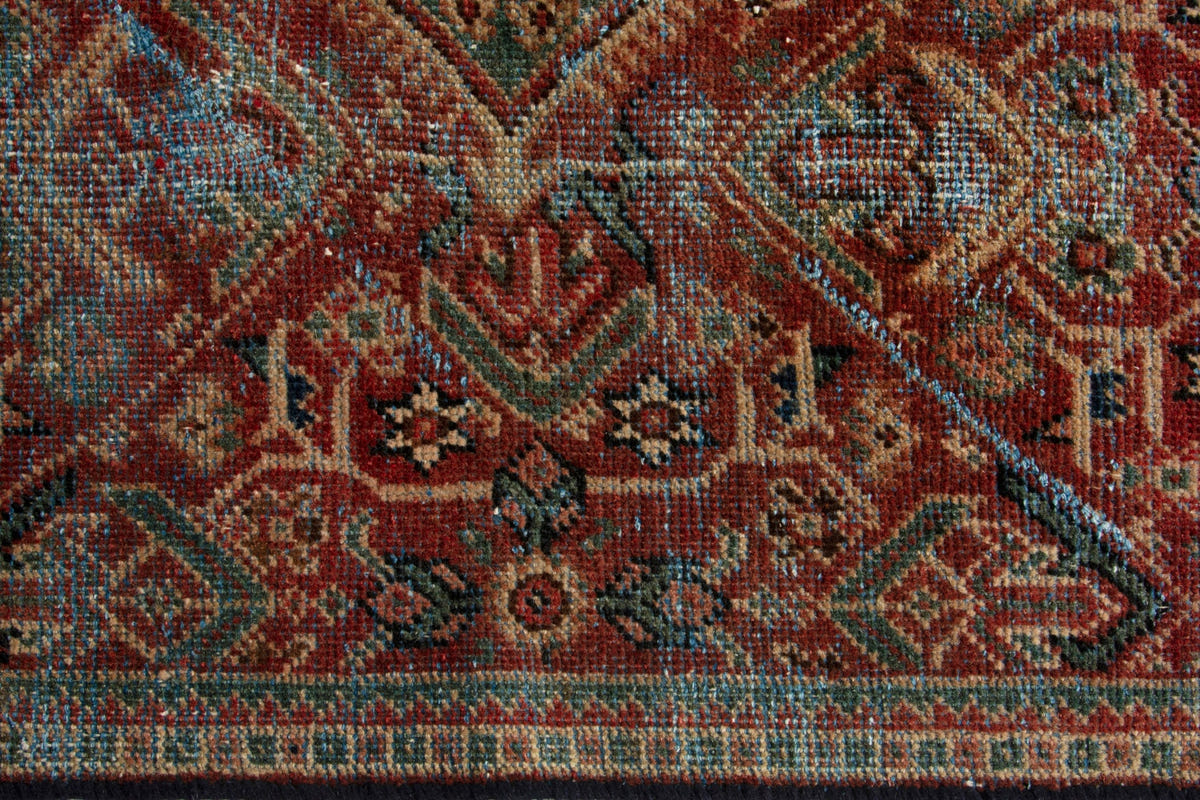 Turkish Anatolian accent rug in burgundy and navy, view 6 of 18
