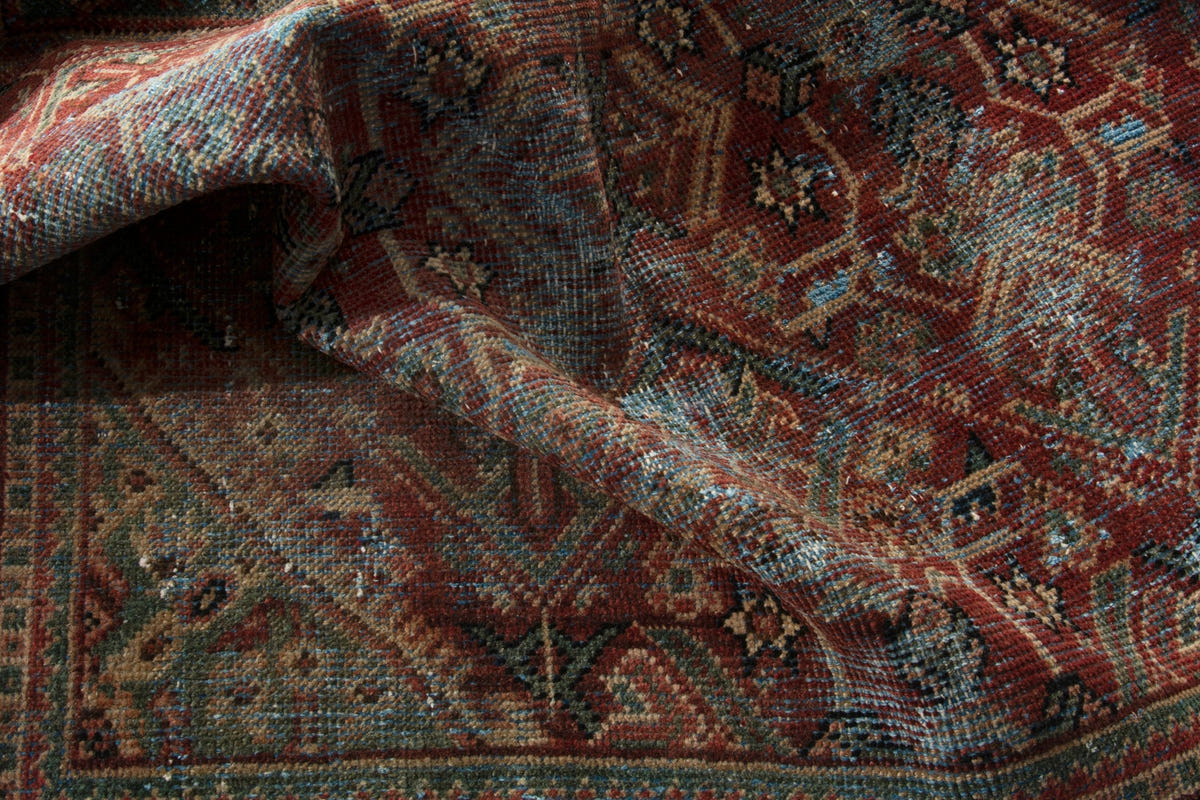 Turkish Anatolian accent rug in burgundy and navy, view 9 of 18