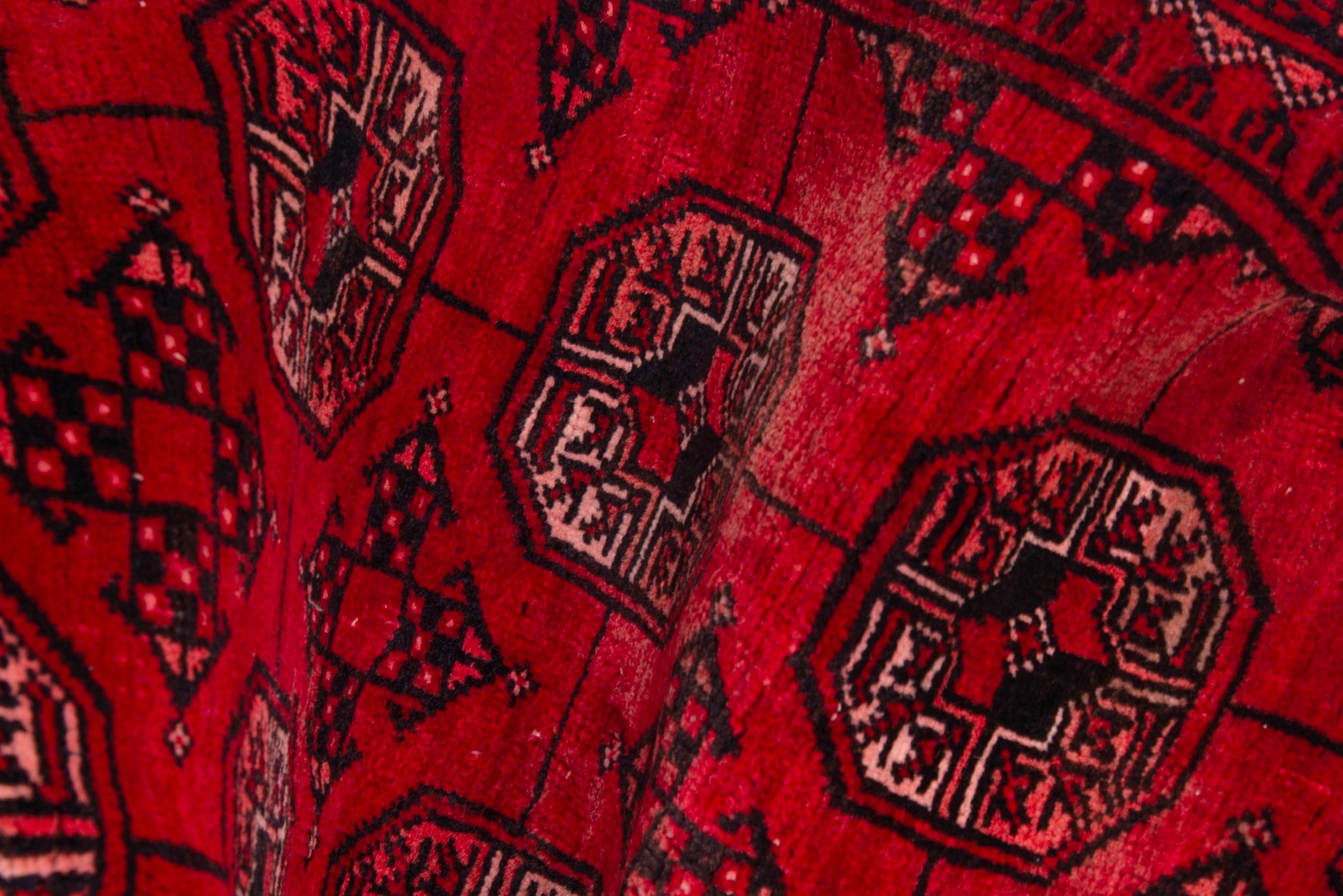 Persian Baluch rug in deep red and faded red, view 17 of 18