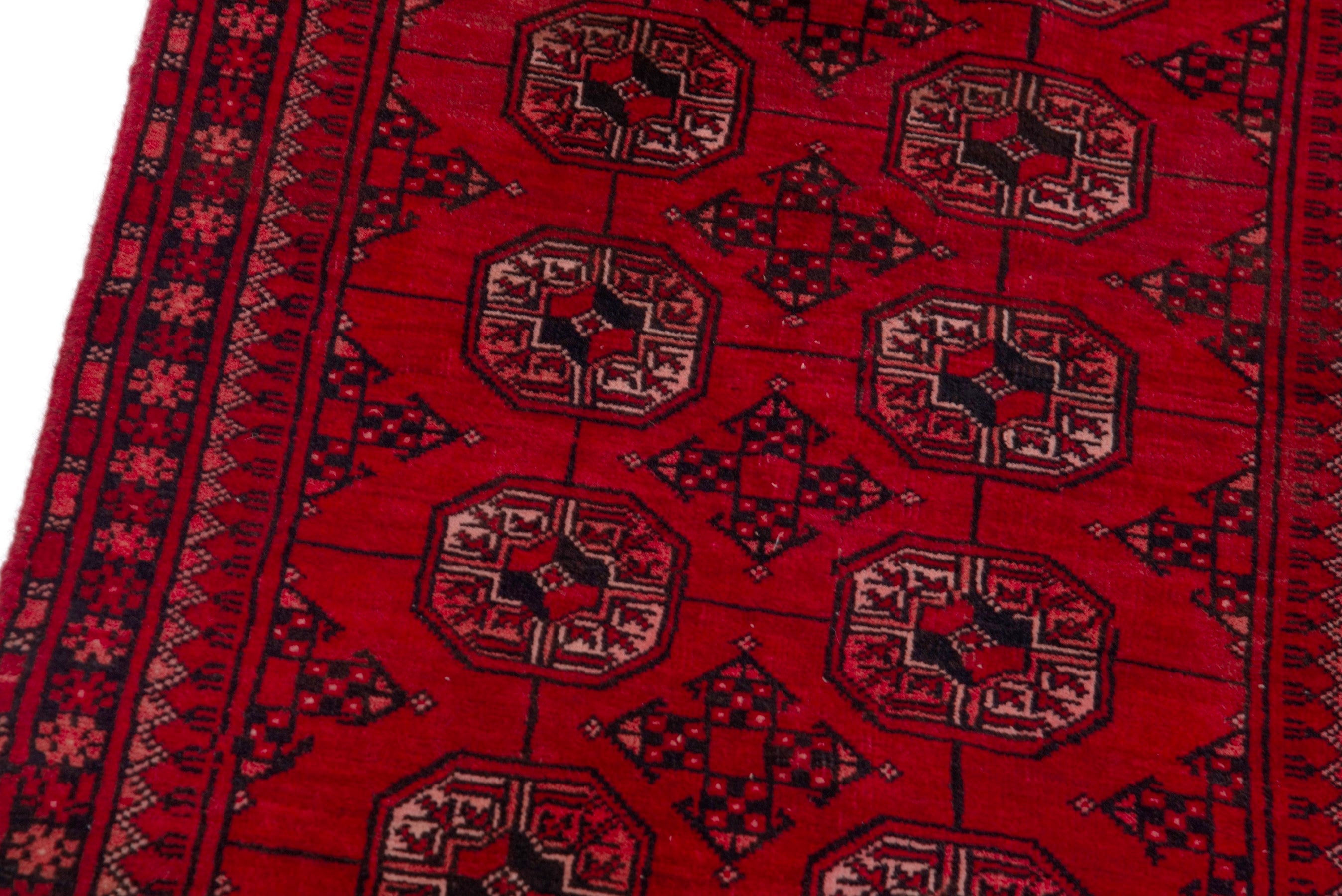 Persian Baluch rug in deep red and faded red, view 10 of 18