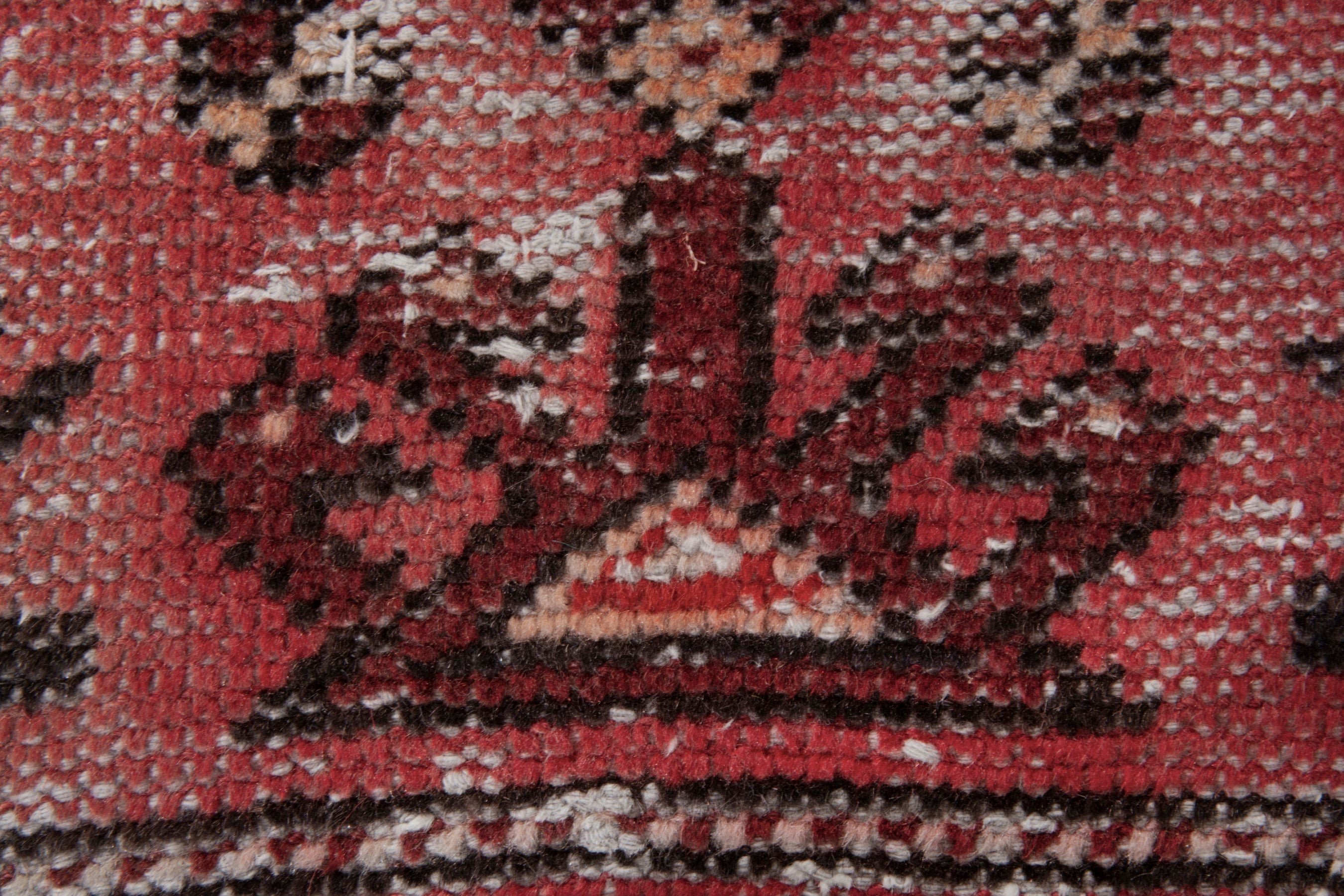 Persian Baluch area rug in faded red and deep red, view 11 of 19