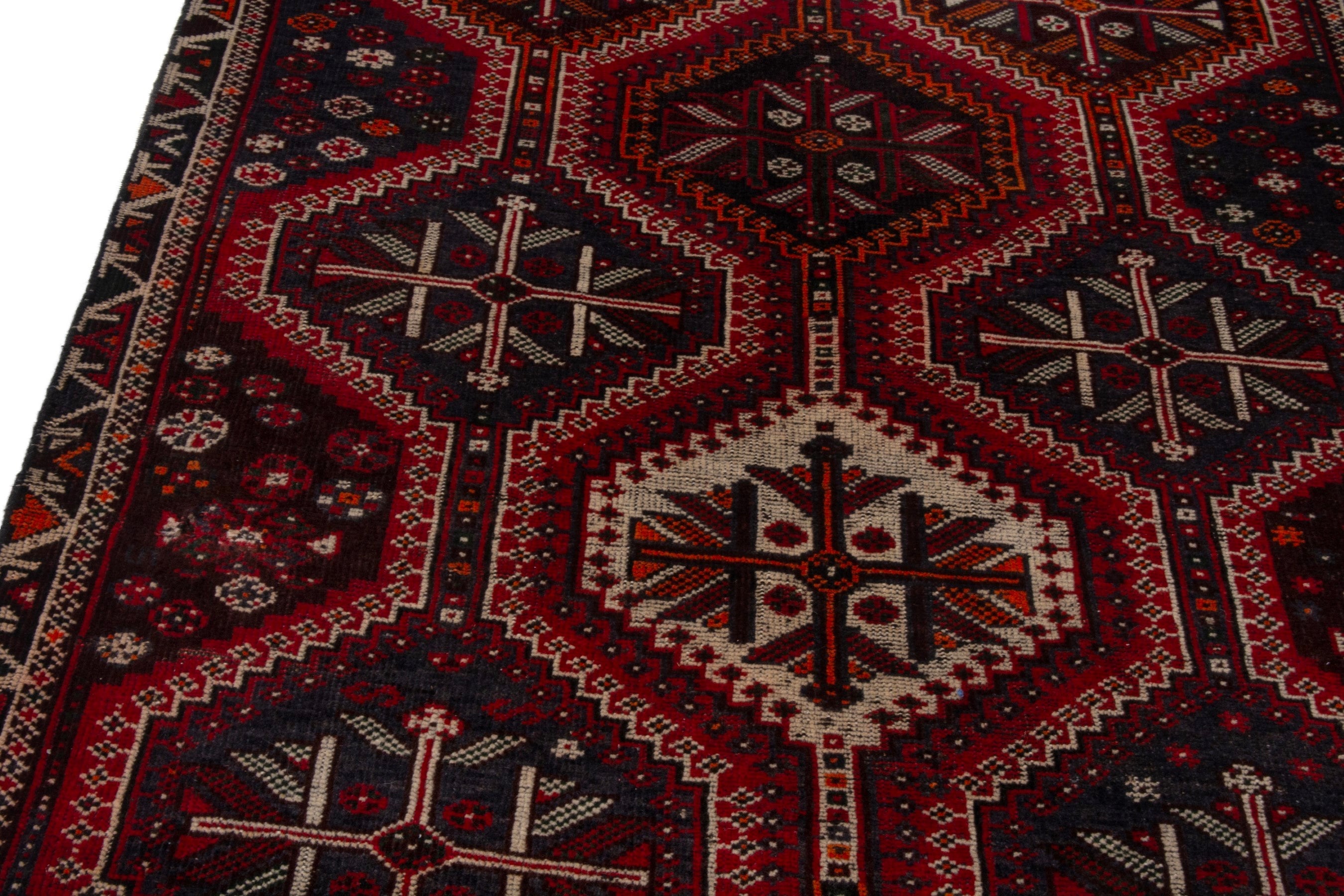 Persian Shiraz area rug in burgundy and deep red, view 9 of 18