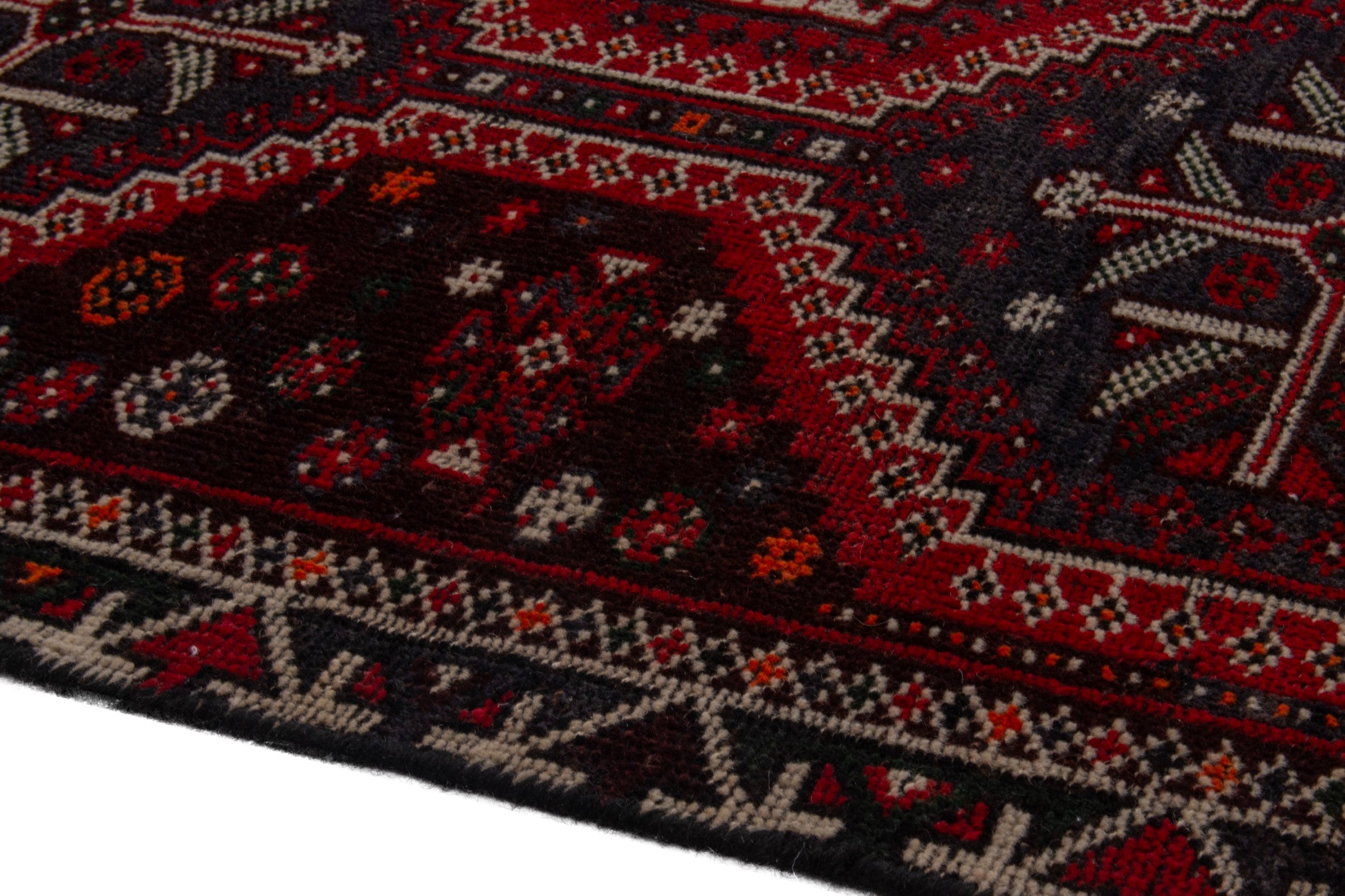 Persian Shiraz area rug in burgundy and deep red, view 5 of 18