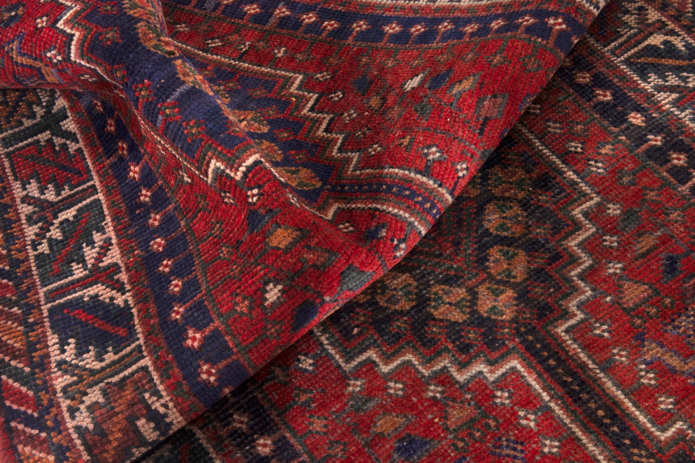 Persian Shiraz runner rug in deep red and cream, view 17 of 18