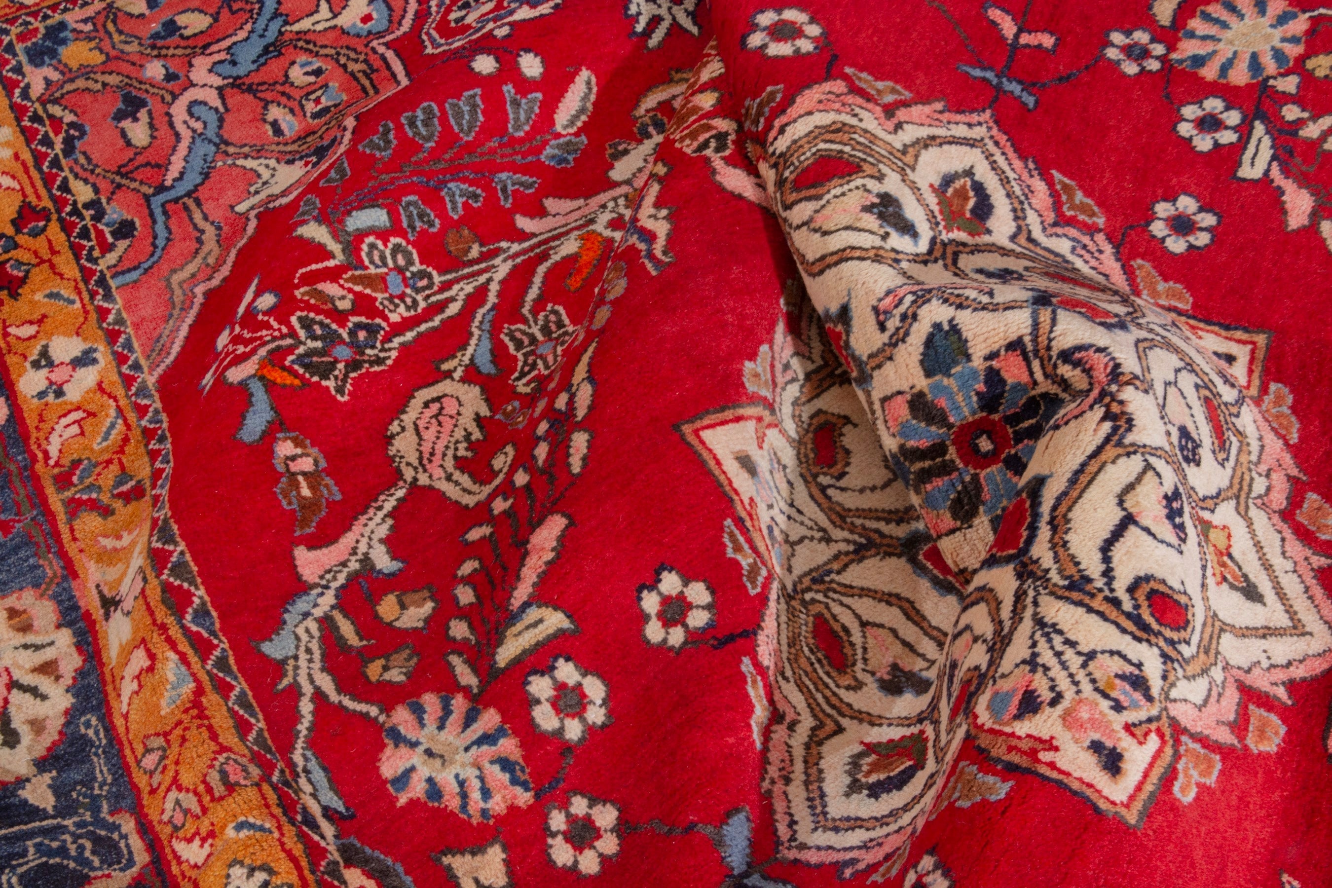 Persian Arak oversized rug in deep red and navy, view 17 of 21