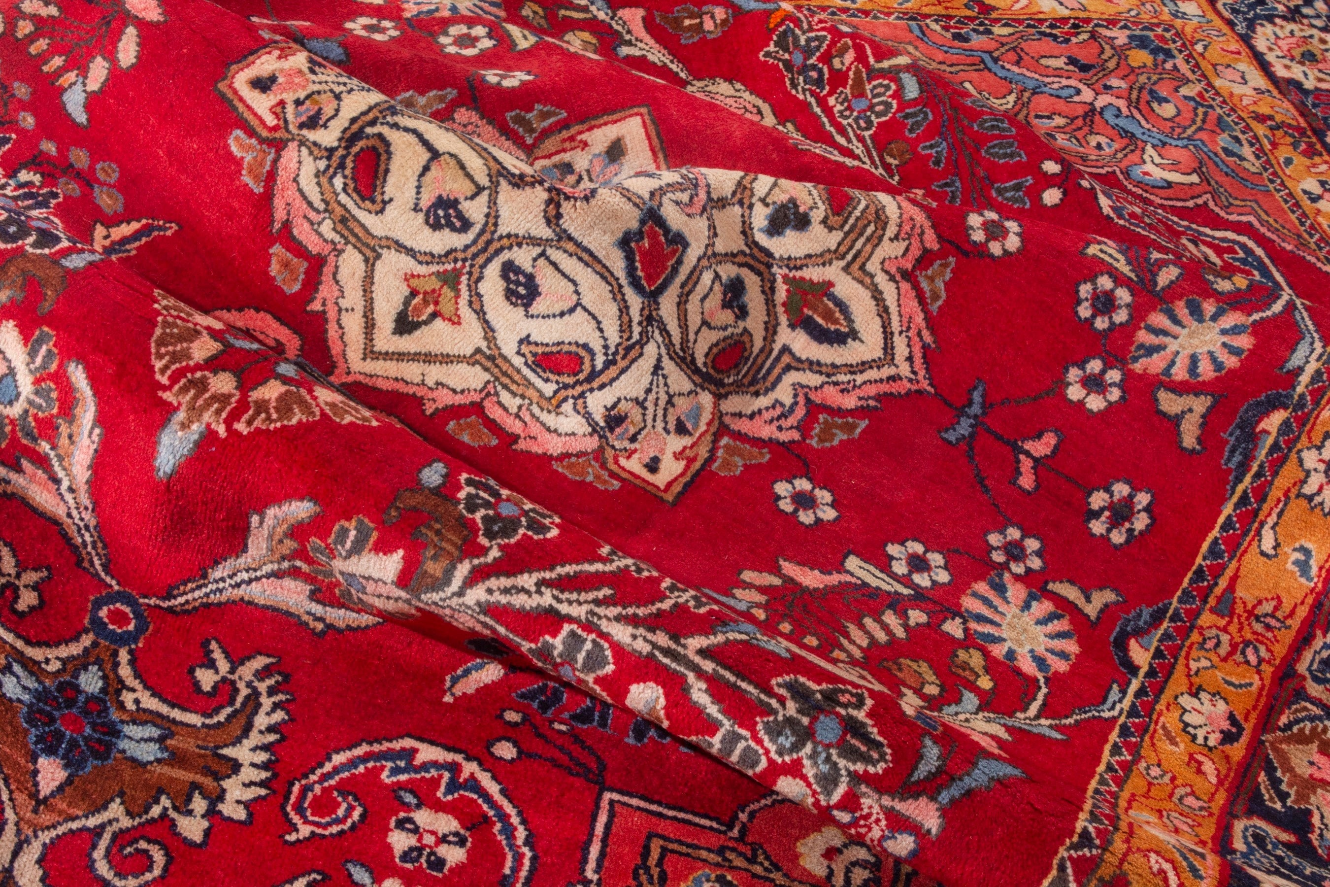 Persian Arak oversized rug in deep red and navy, view 19 of 21