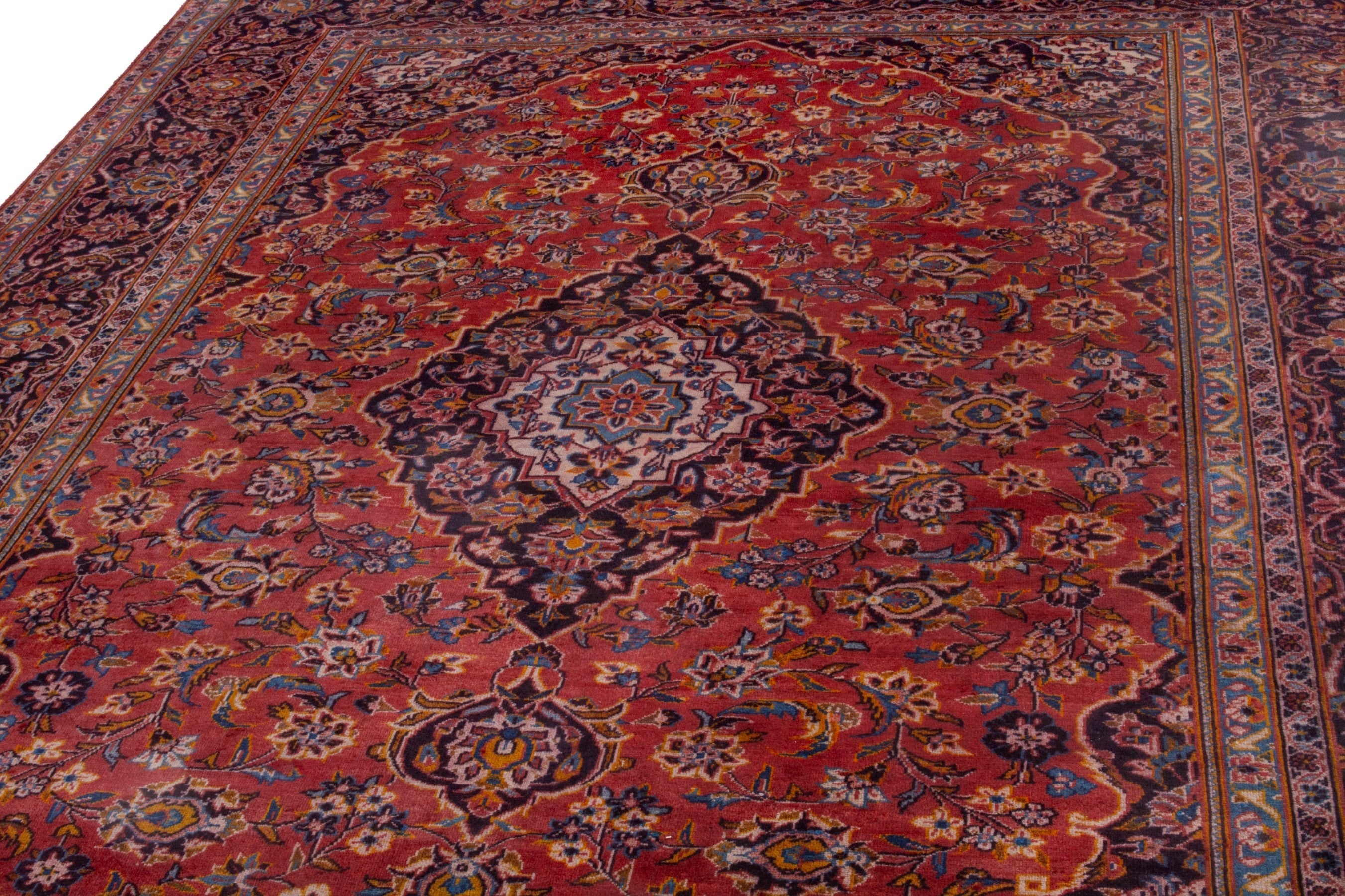 Persian Kashan oversized rug in deep red and burgundy, view 6 of 21
