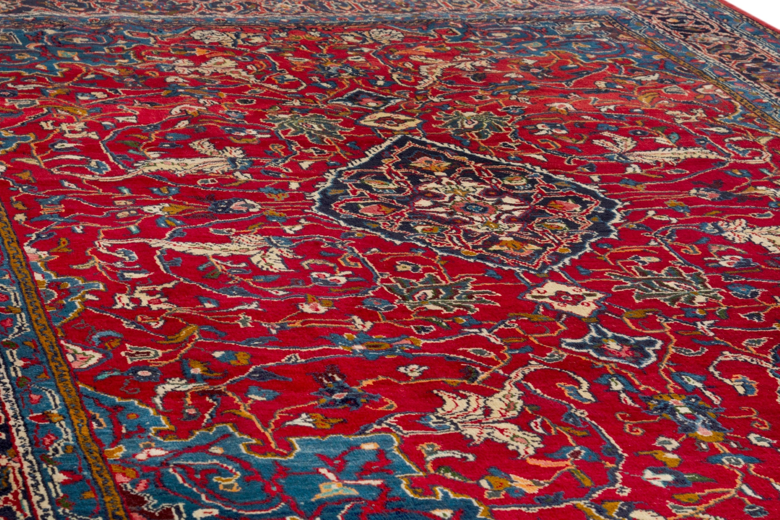 Persian Arak area rug in deep red and navy, view 7 of 18