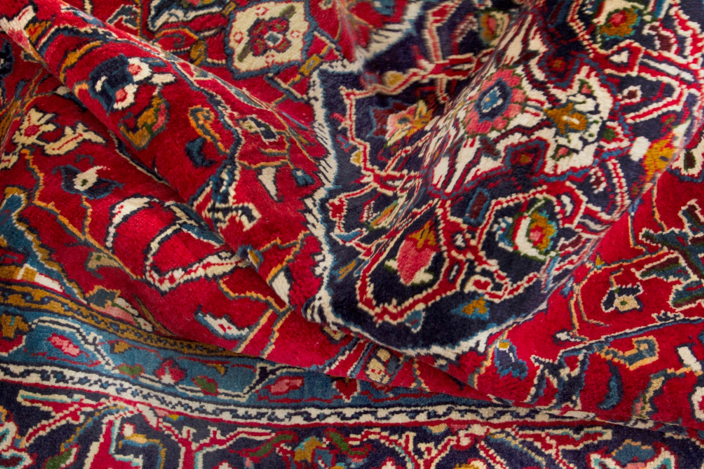 Persian Arak area rug in deep red and navy, view 15 of 18