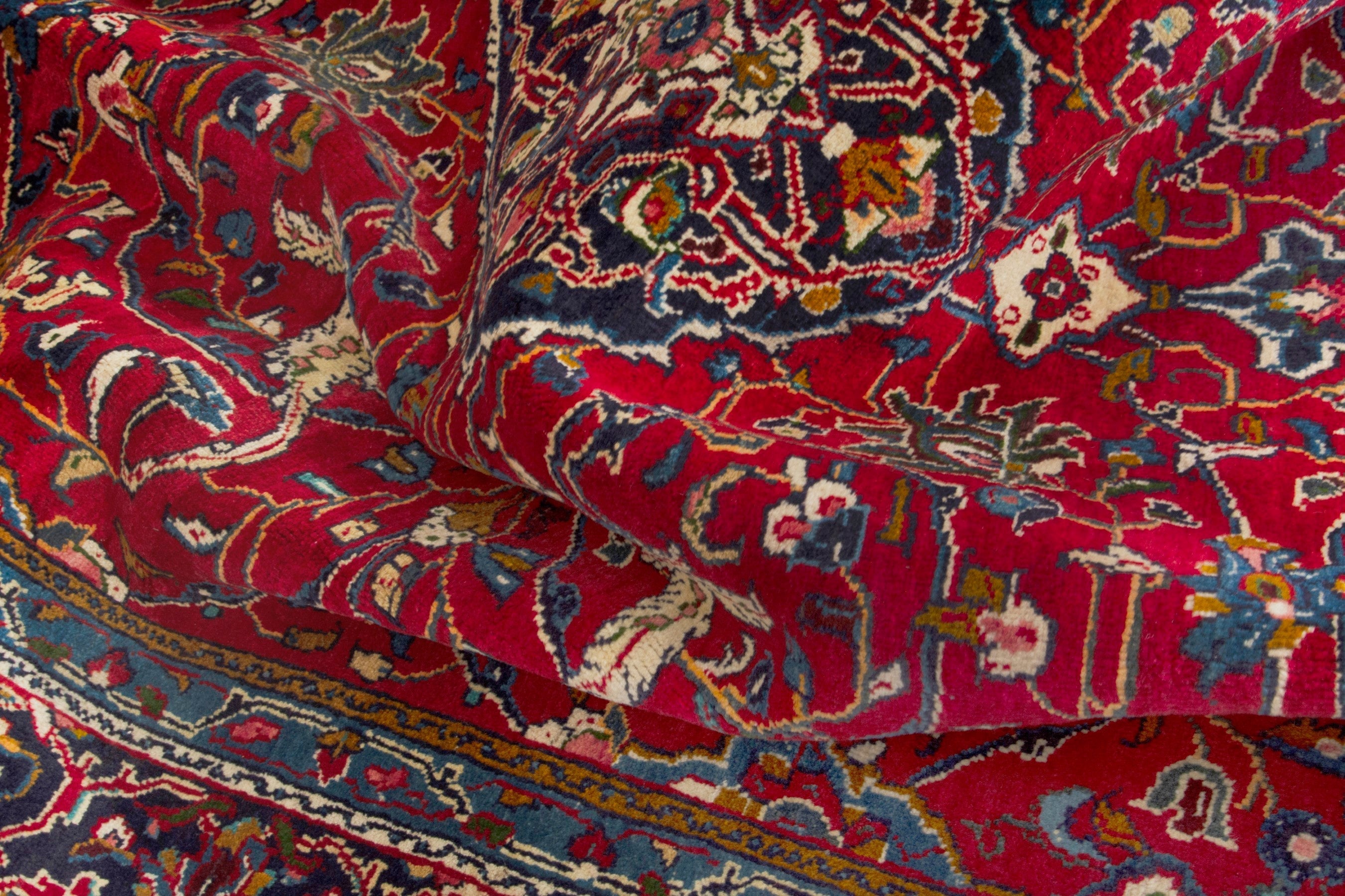 Persian Arak area rug in deep red and navy, view 17 of 18