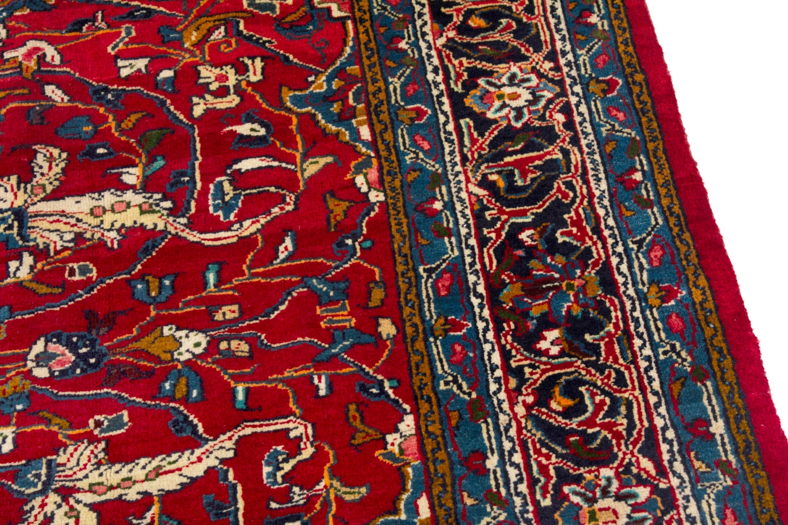 Persian Arak area rug in deep red and navy, view 9 of 18