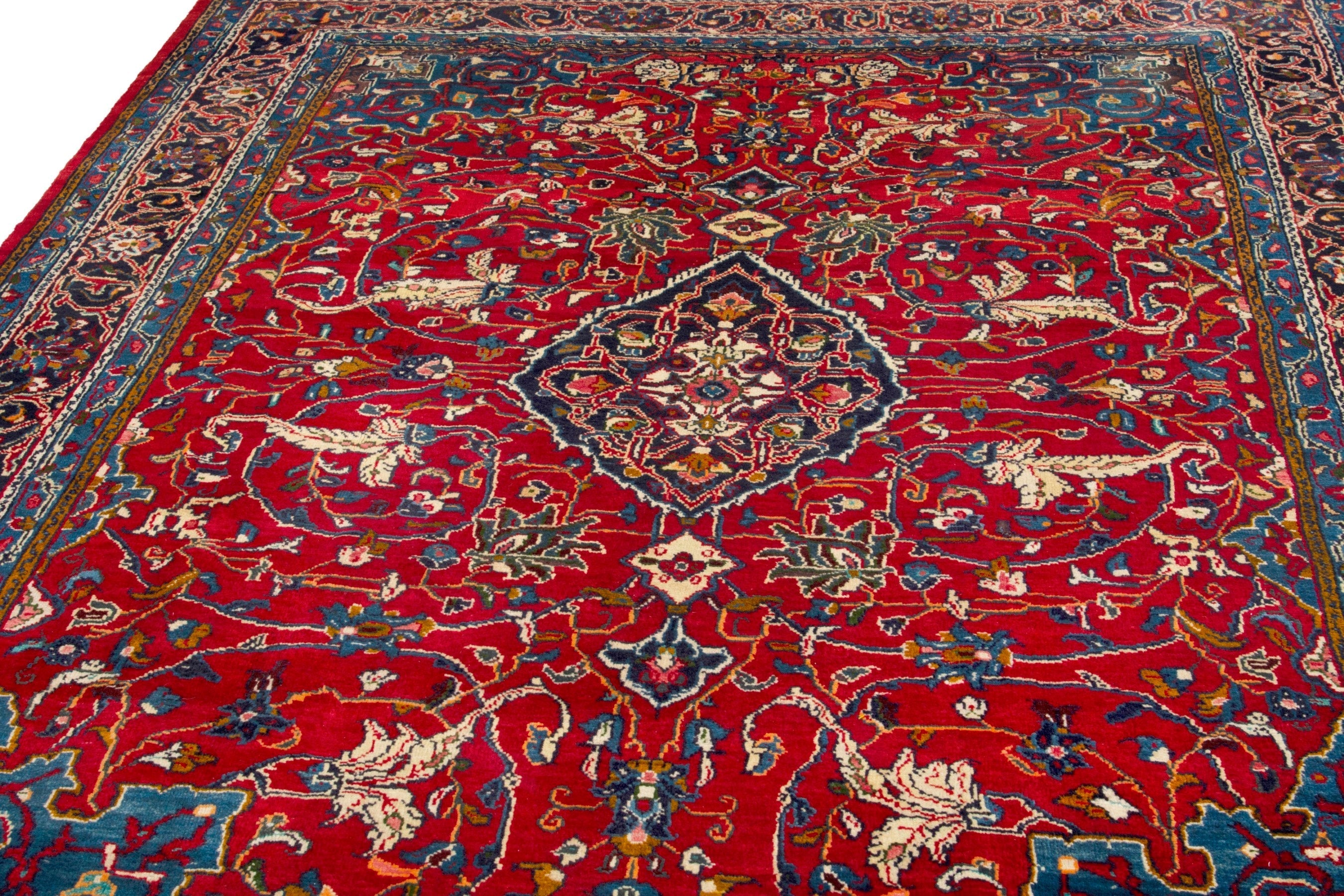 Persian Arak area rug in deep red and navy, view 6 of 18