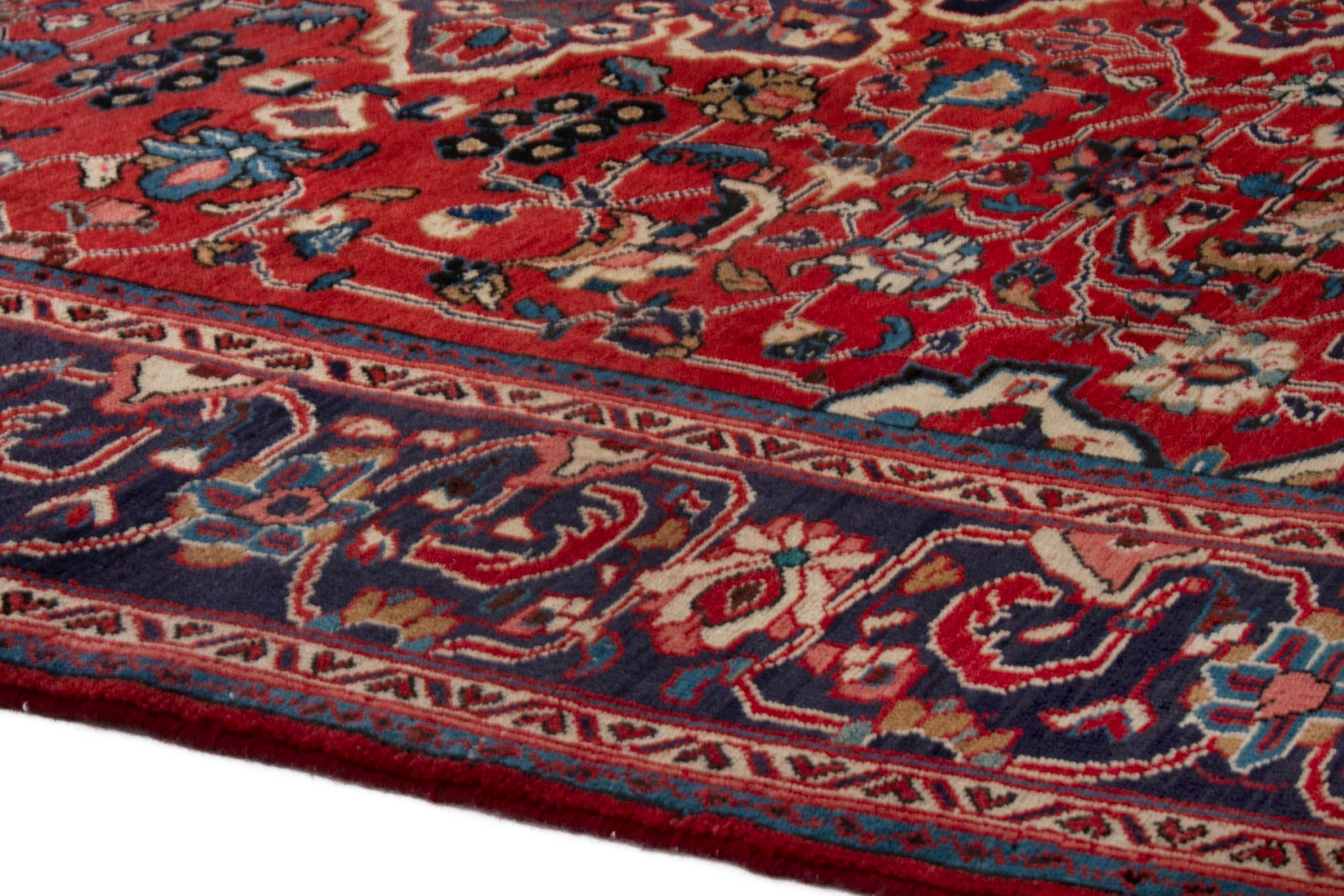 Persian Arak oversized rug in deep red and burgundy, view 5 of 20