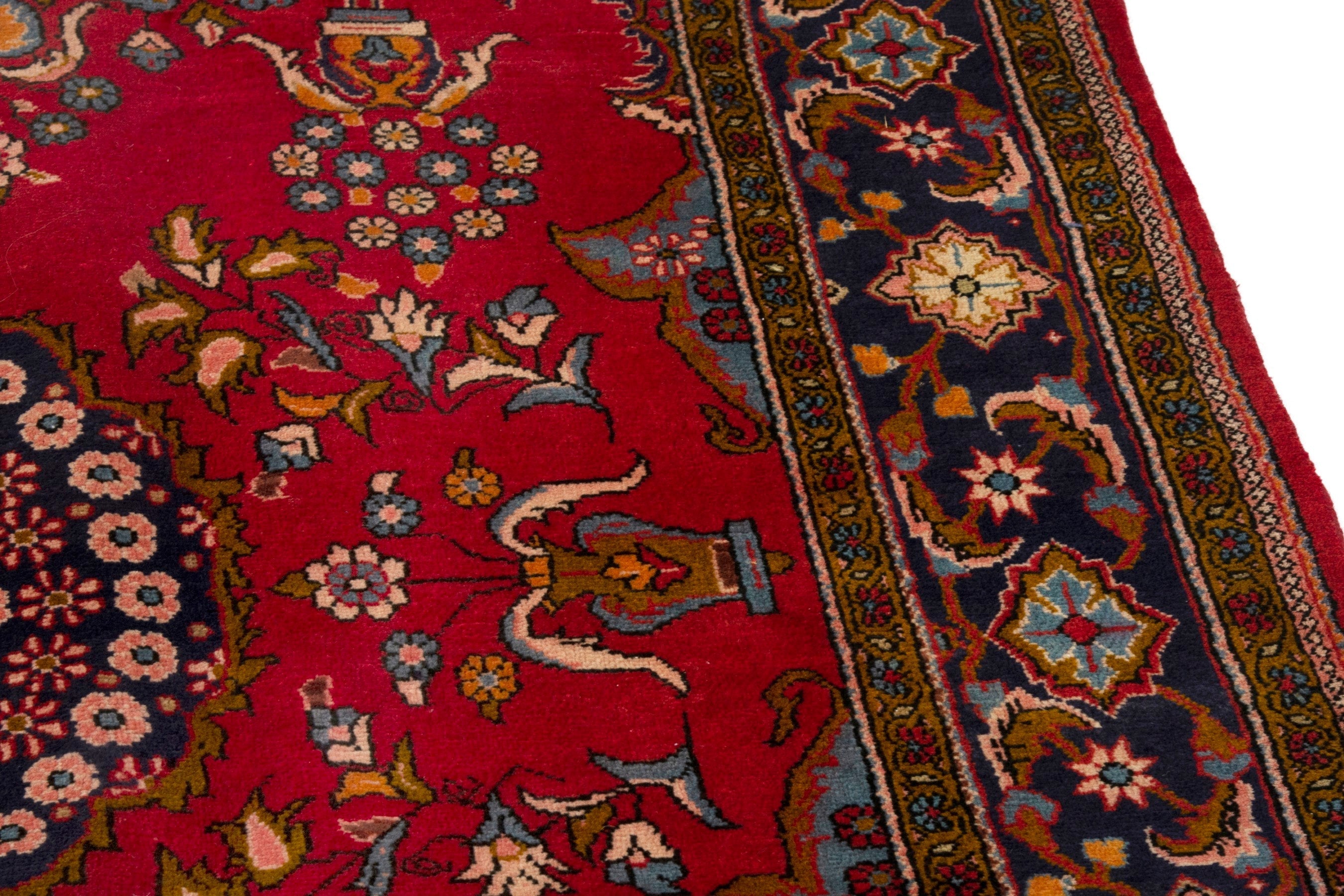 Persian Vist oversized rug in deep red and dark blue, view 9 of 18