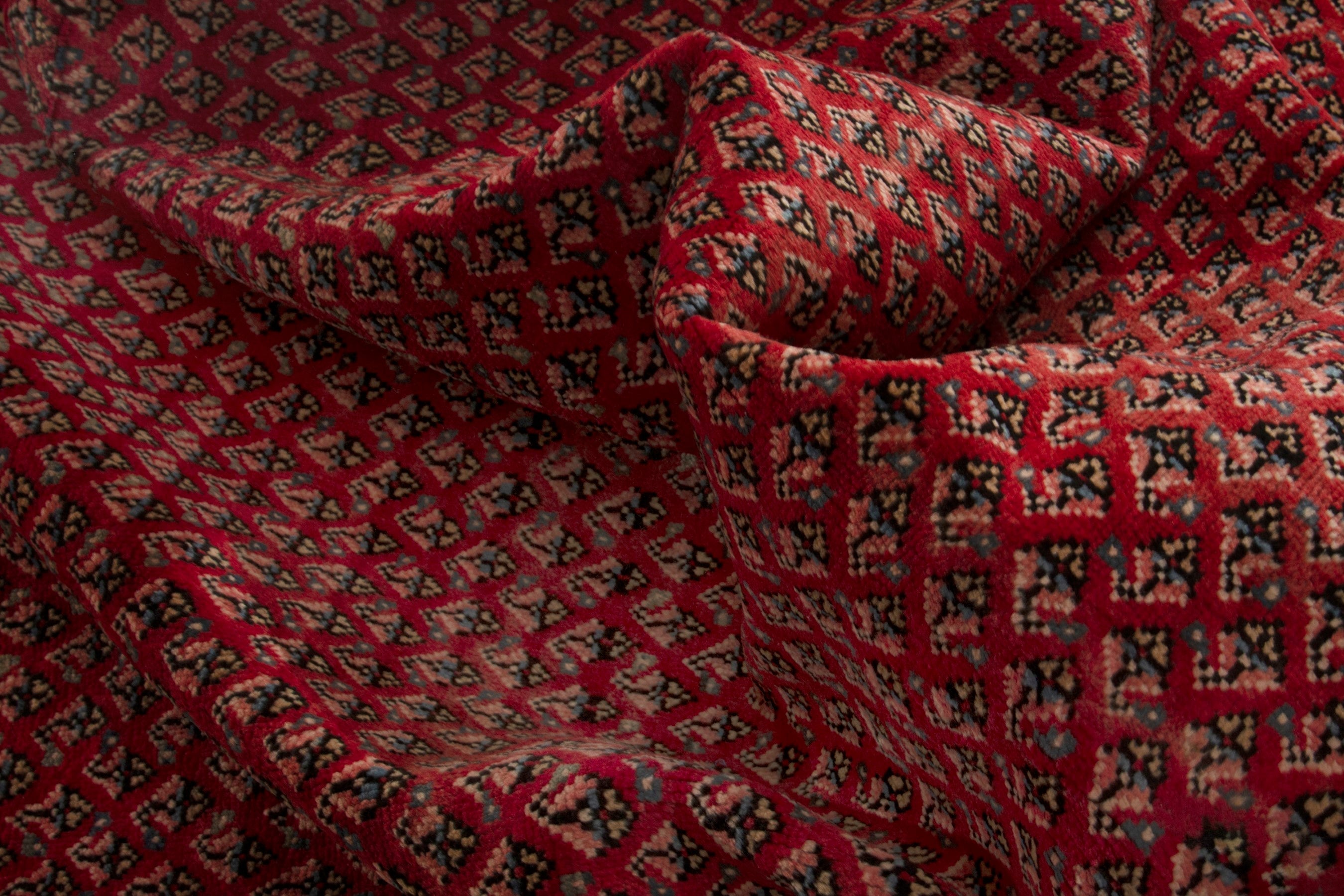 Persian Arak oversized rug in deep red and burgundy, view 15 of 18