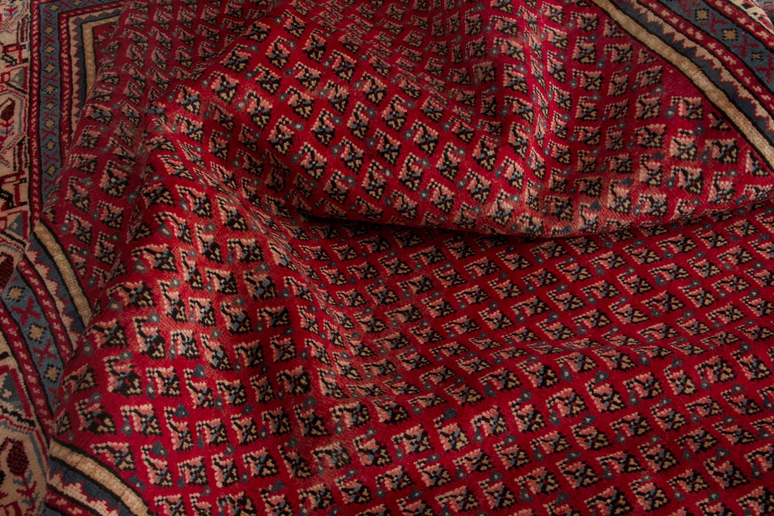 Persian Arak oversized rug in deep red and burgundy, view 17 of 18