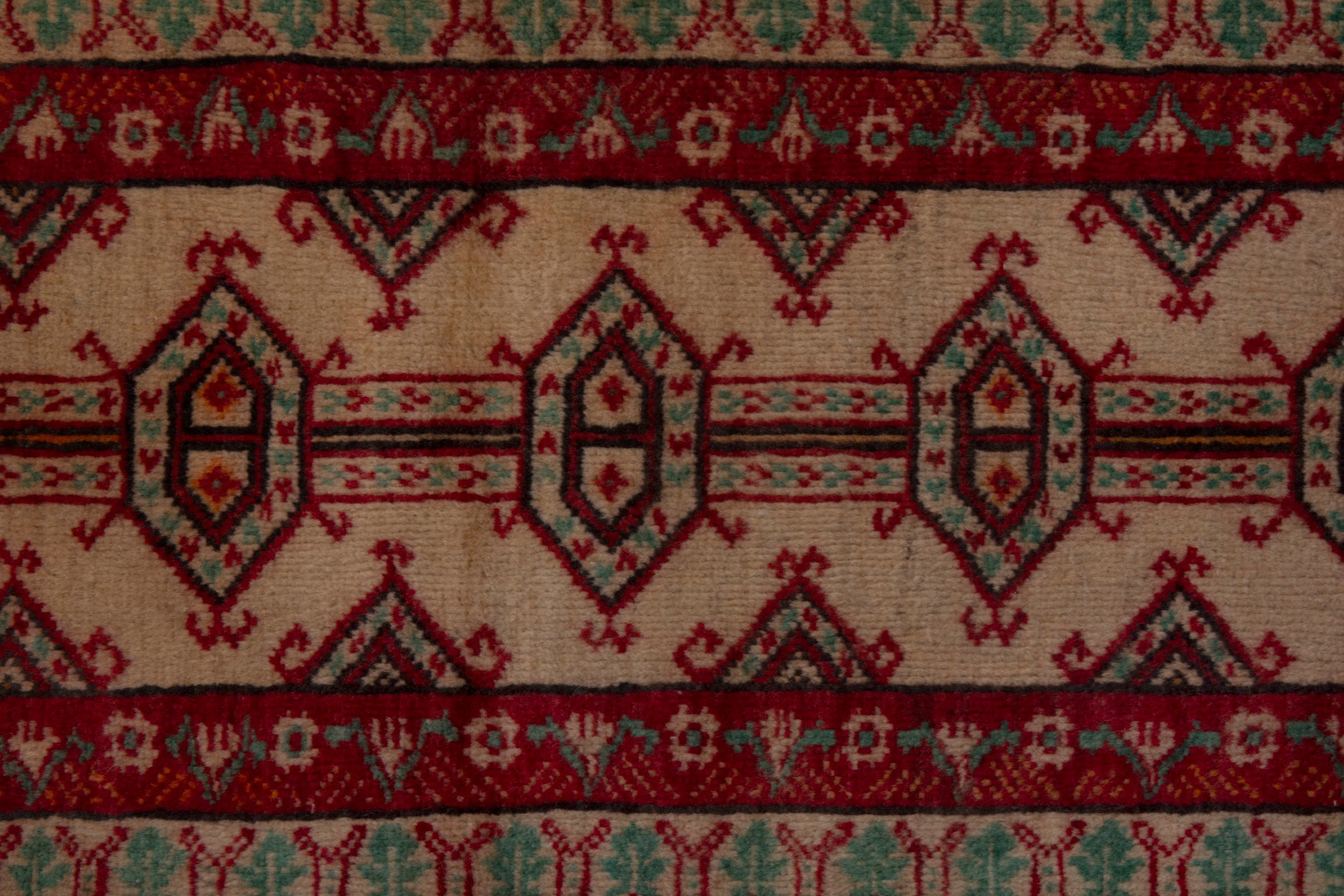 Persian Torkaman accent rug in deep red and burgundy, view 6 of 7
