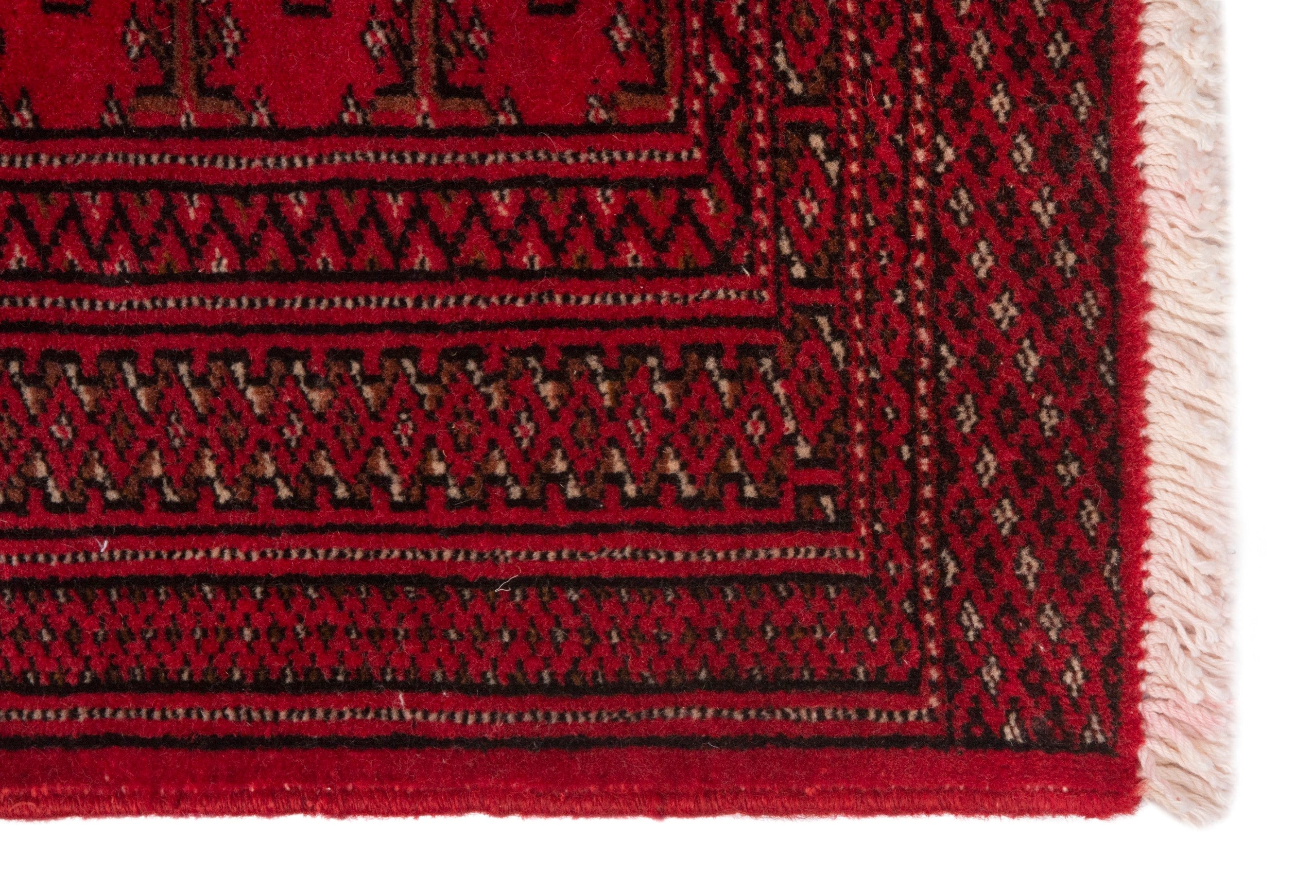 Persian Torkaman accent rug in deep red and dark brown, view 4 of 7