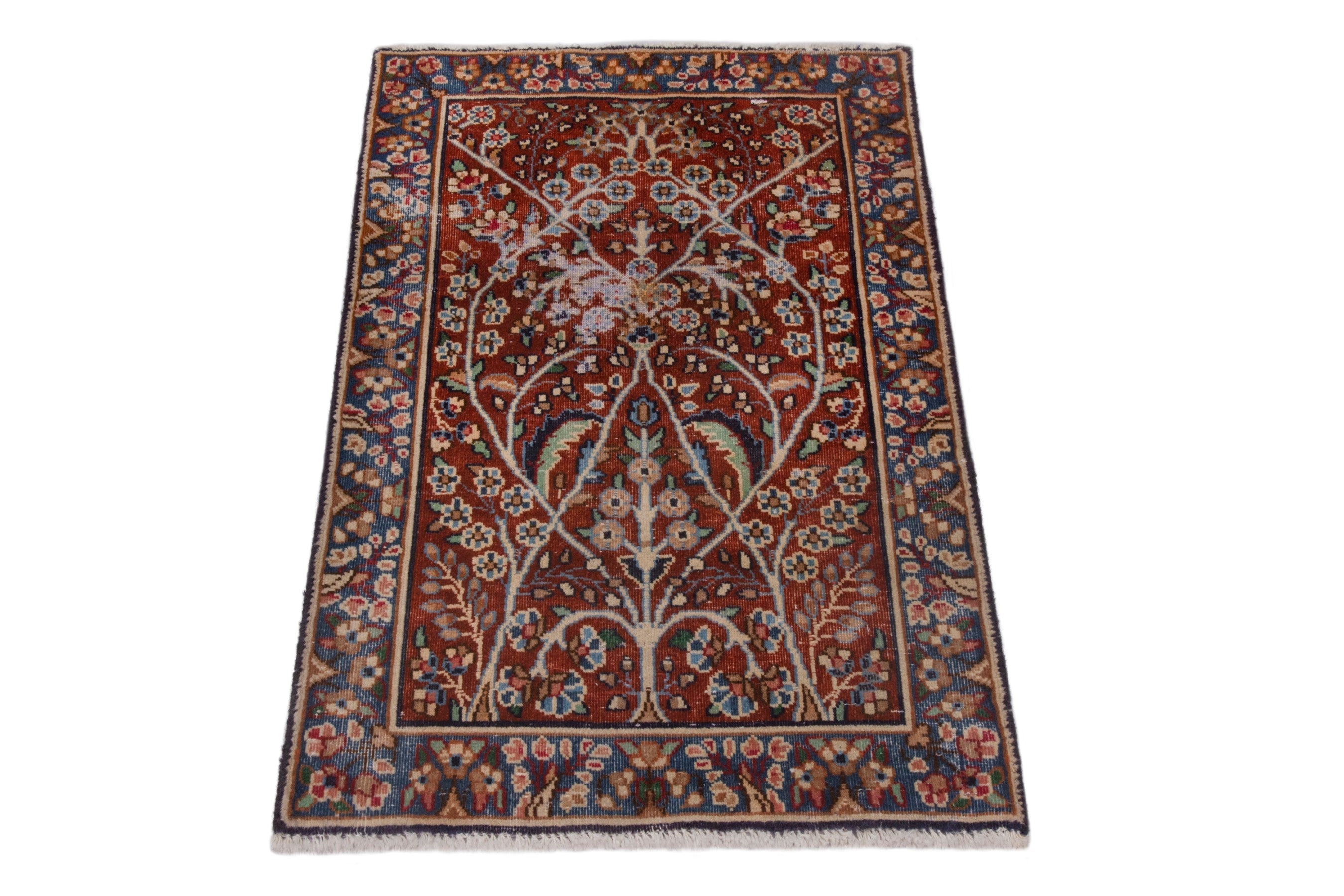 Persian Kerman accent rug in burgundy and navy, view 2 of 7