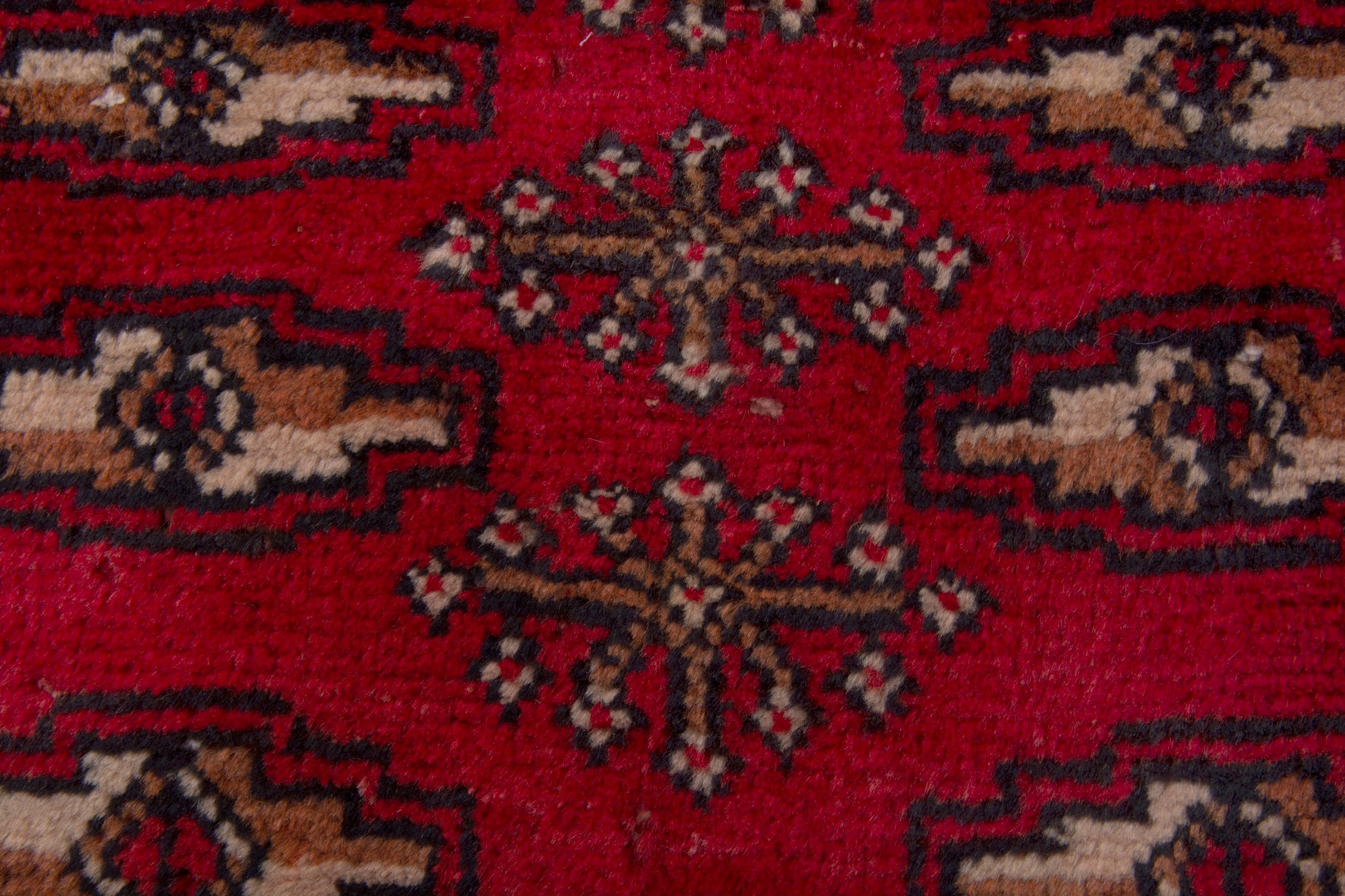 Persian Torkaman accent rug in deep red and burgundy, view 6 of 7