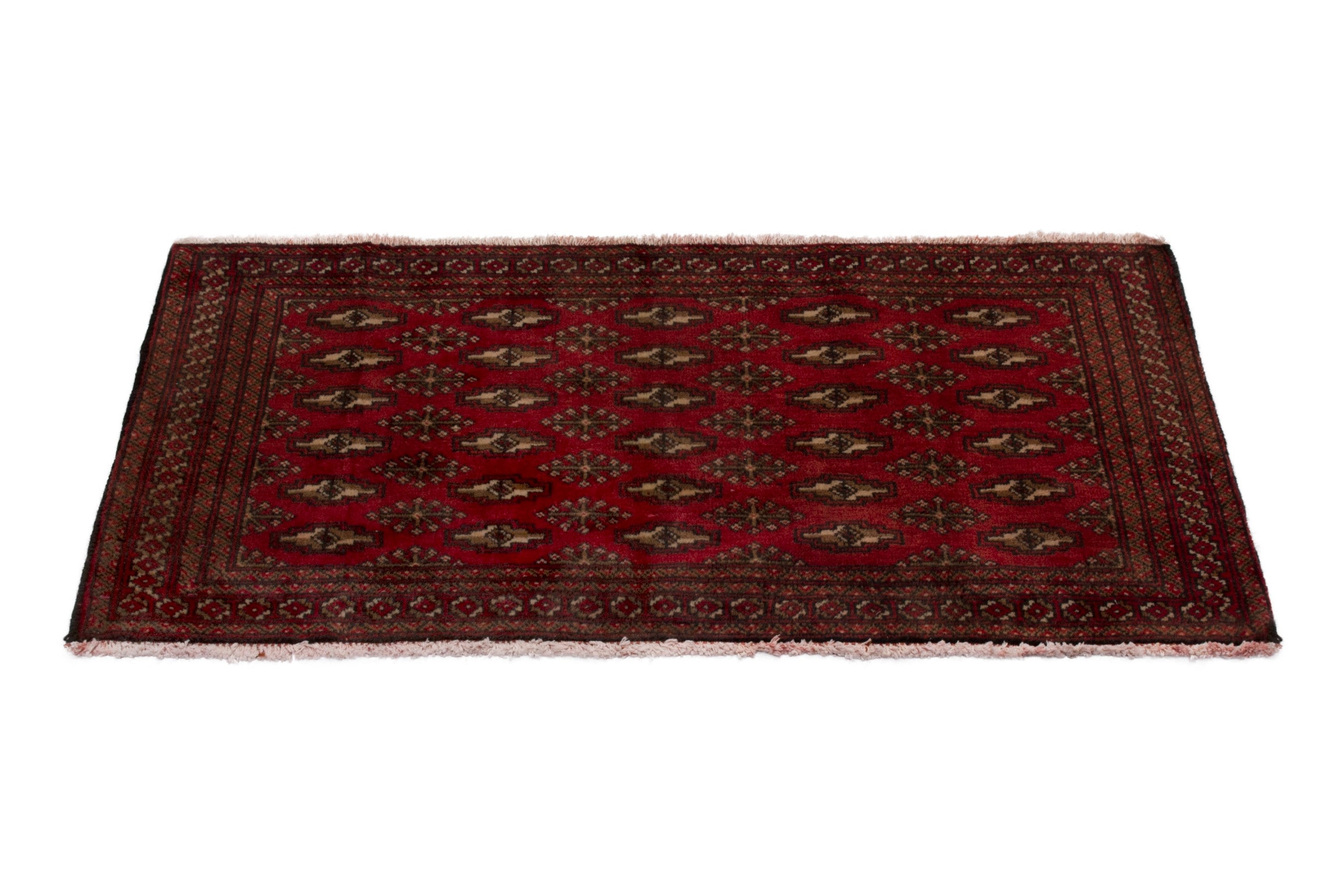 Persian Torkaman accent rug in deep red and cream, view 2 of 7