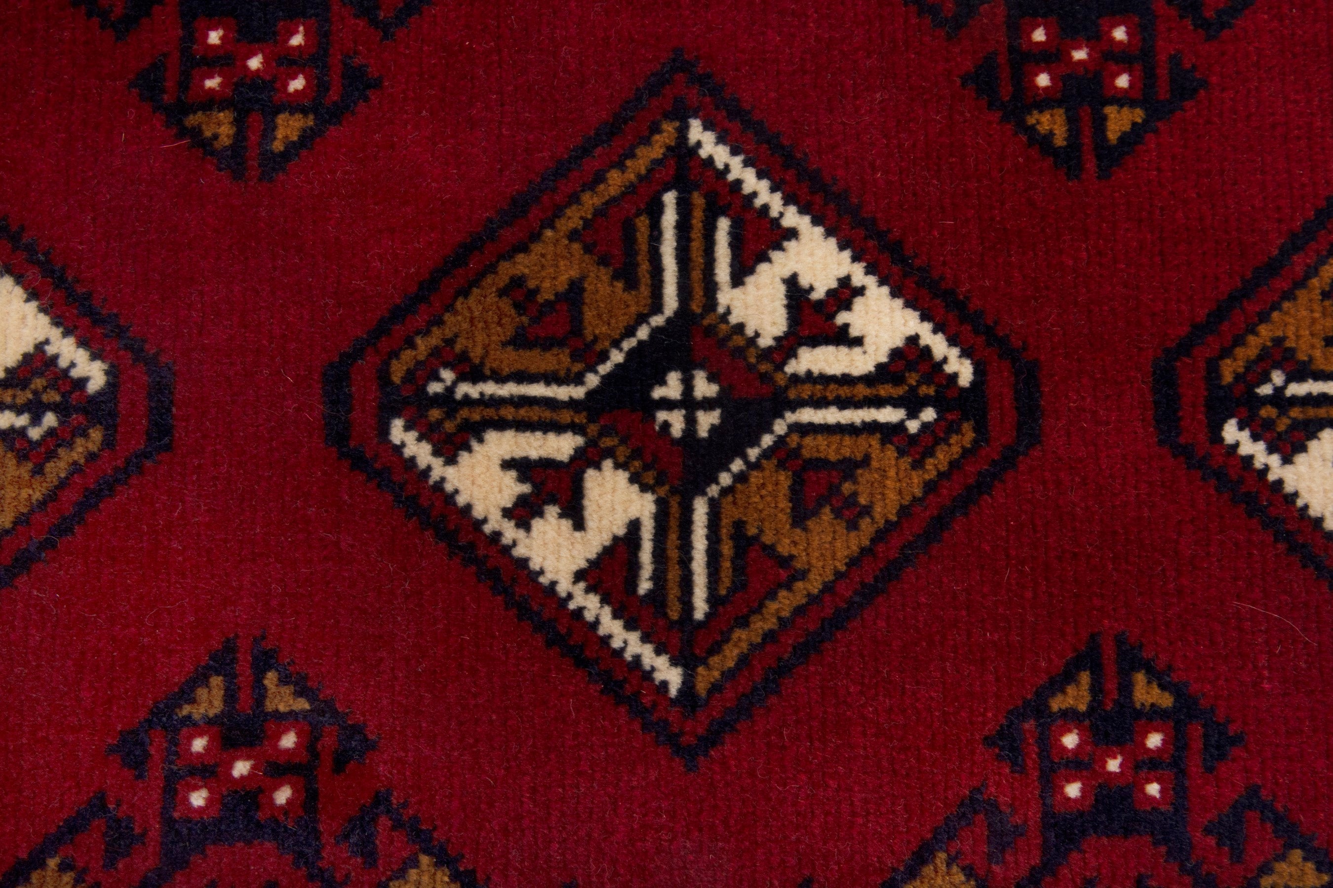 Persian Torkaman accent rug in deep red and burgundy, view 6 of 7