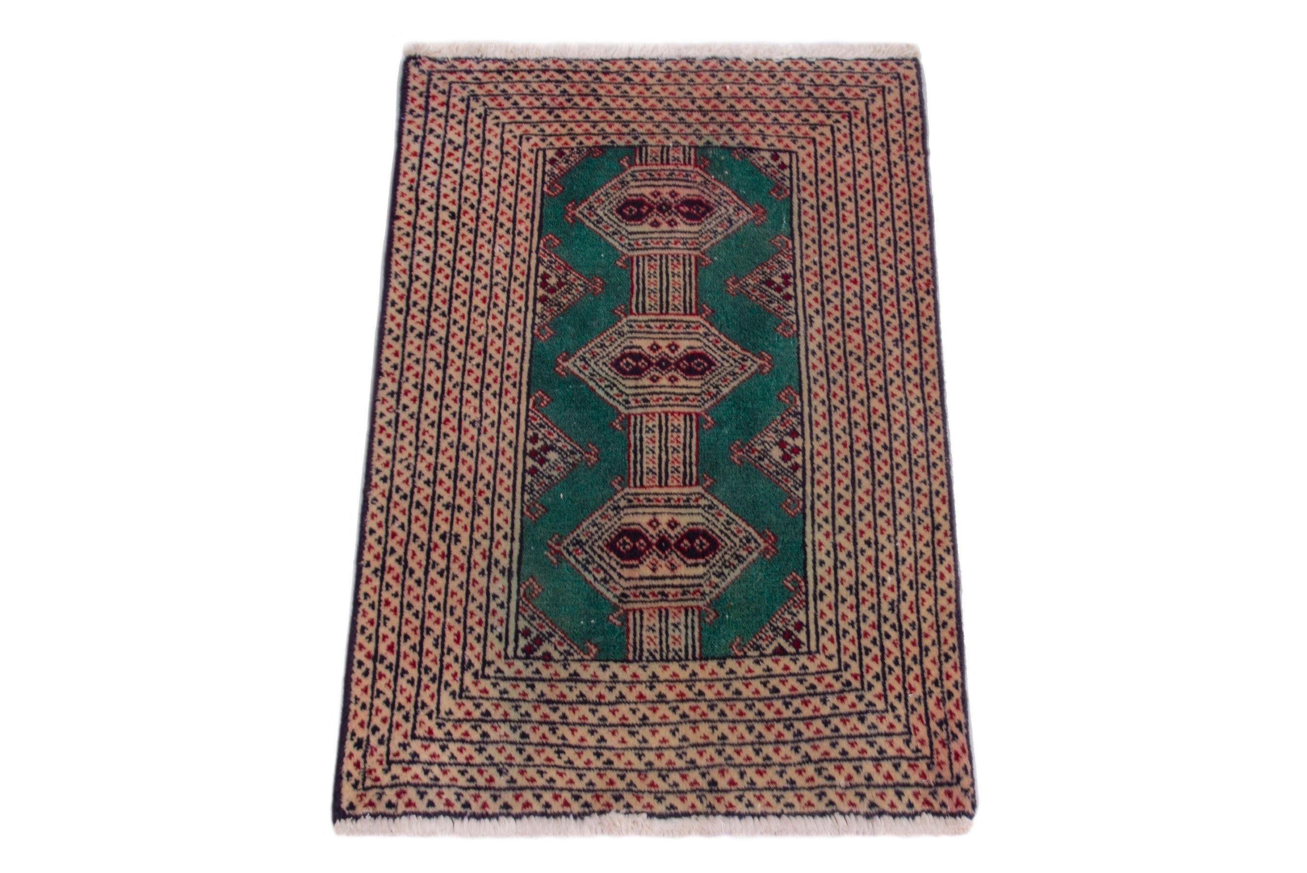 Persian Torkaman accent rug in rust and teal, view 2 of 7